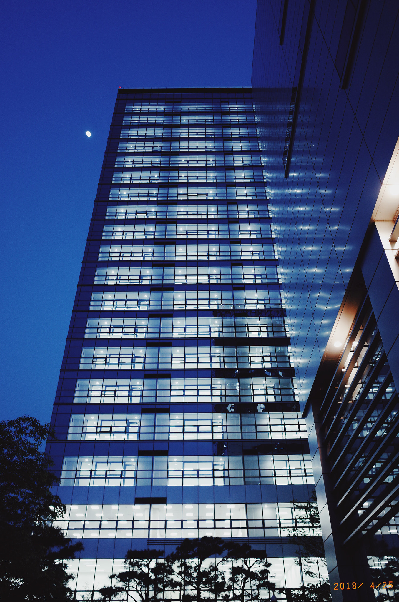 Ricoh GR sample photo. Moon and building photography