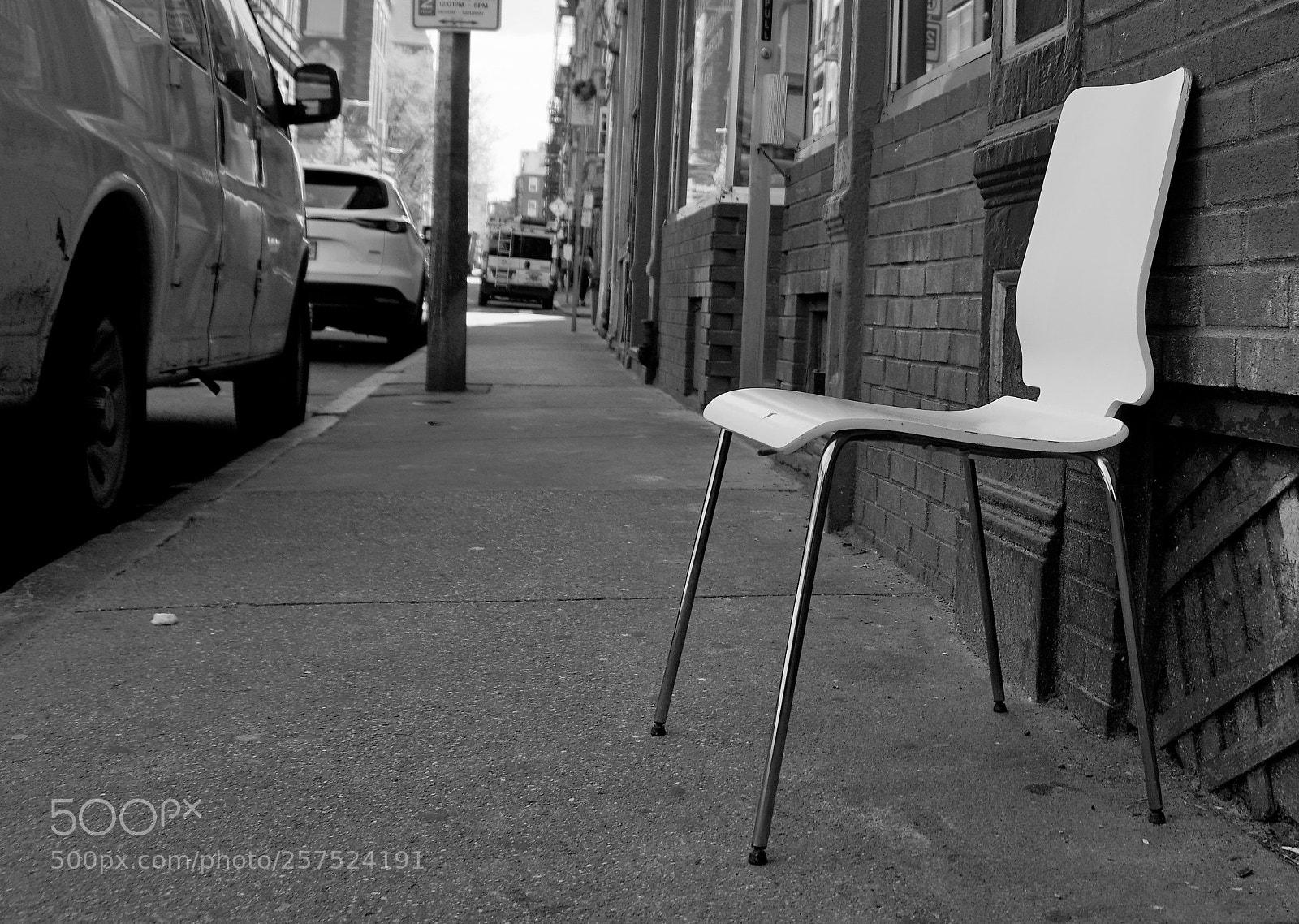 Sony a6500 sample photo. Chair on a sidewalk photography