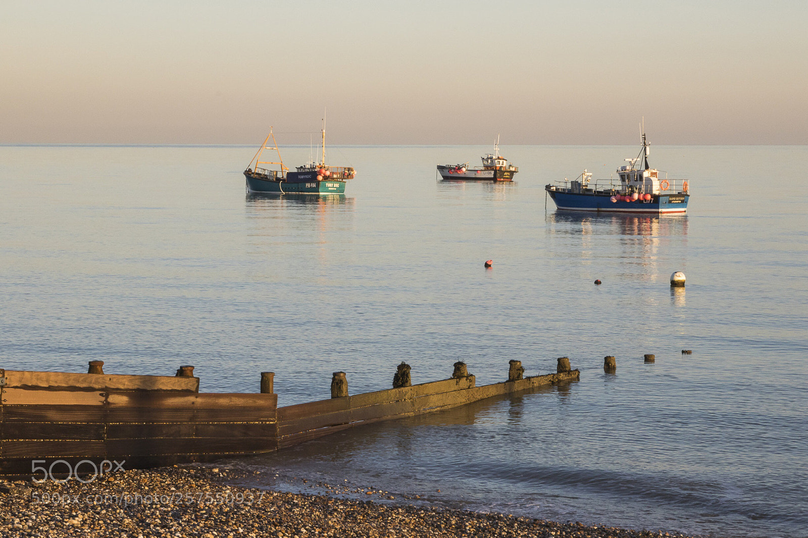 Canon EOS 7D Mark II sample photo. Boats at sunset photography