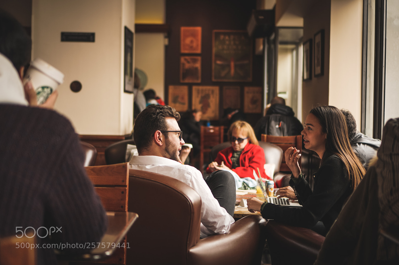 Sony a6500 sample photo. Couple talking in a photography