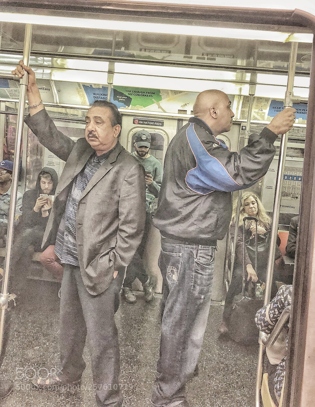 Apple iPhone X sample photo. Subway riders. nyc photography