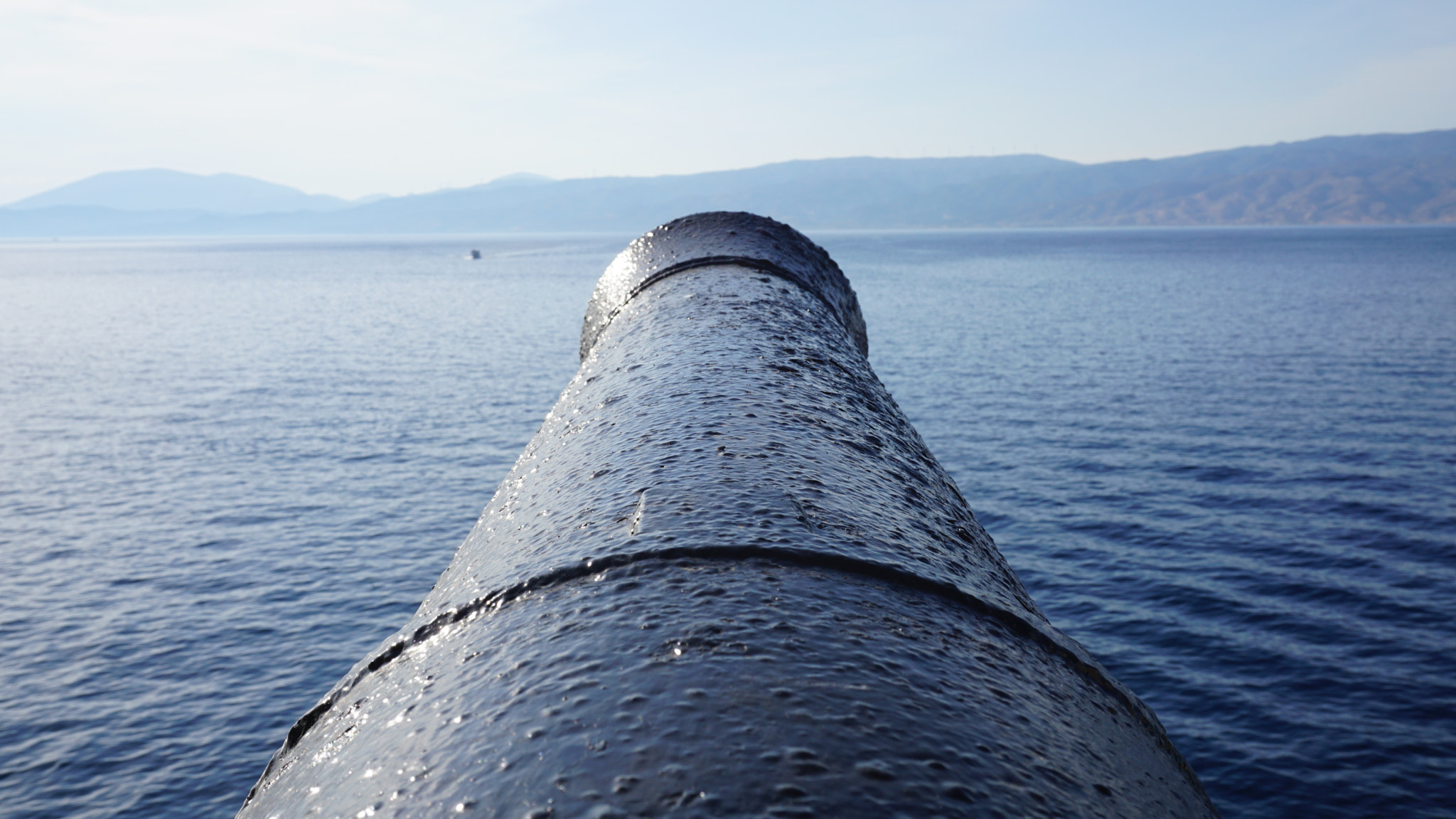 Sony a6000 + Sony E 18-50mm F4-5.6 sample photo. Cannon ball over the sea photography