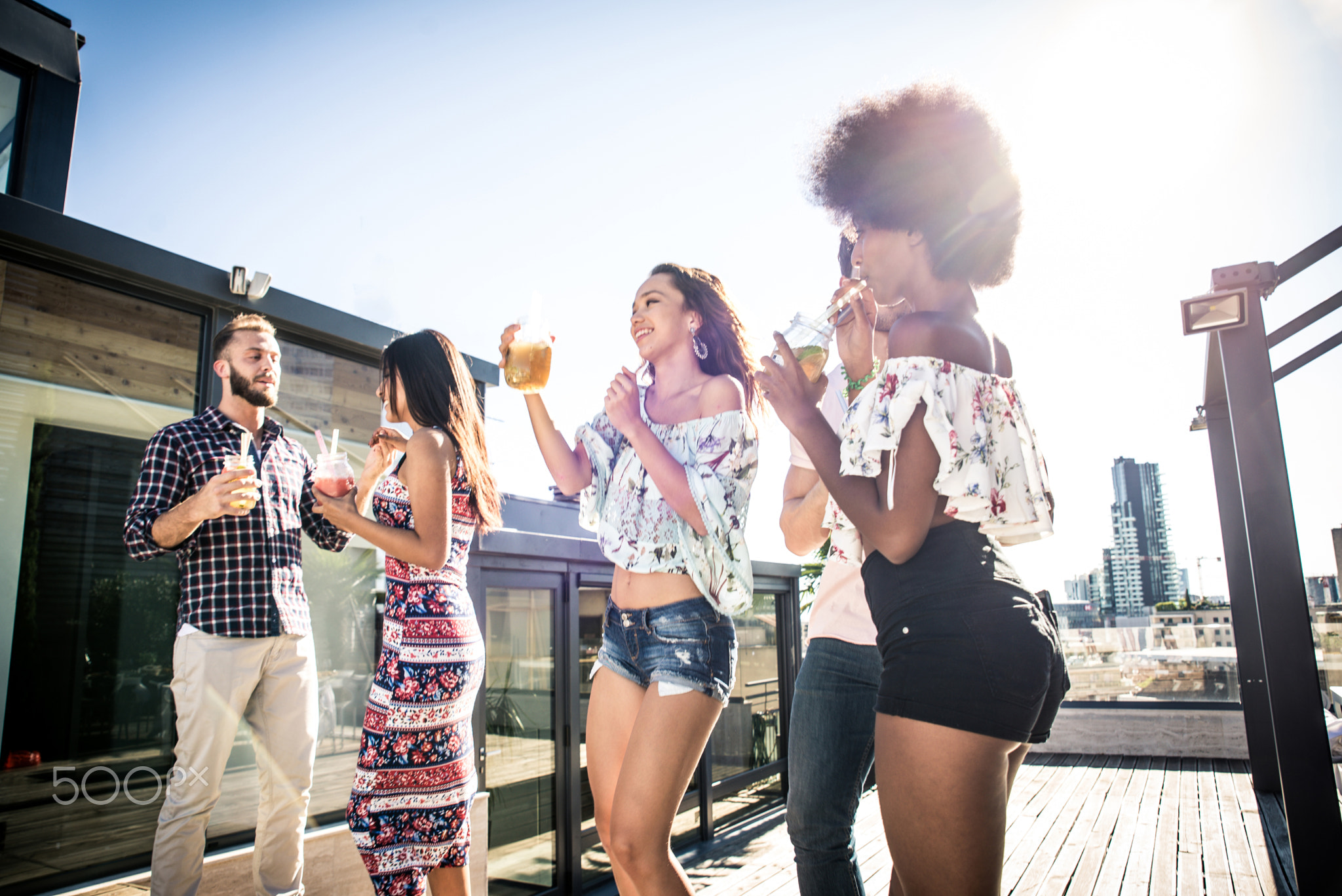 Friends partying on a rooftop