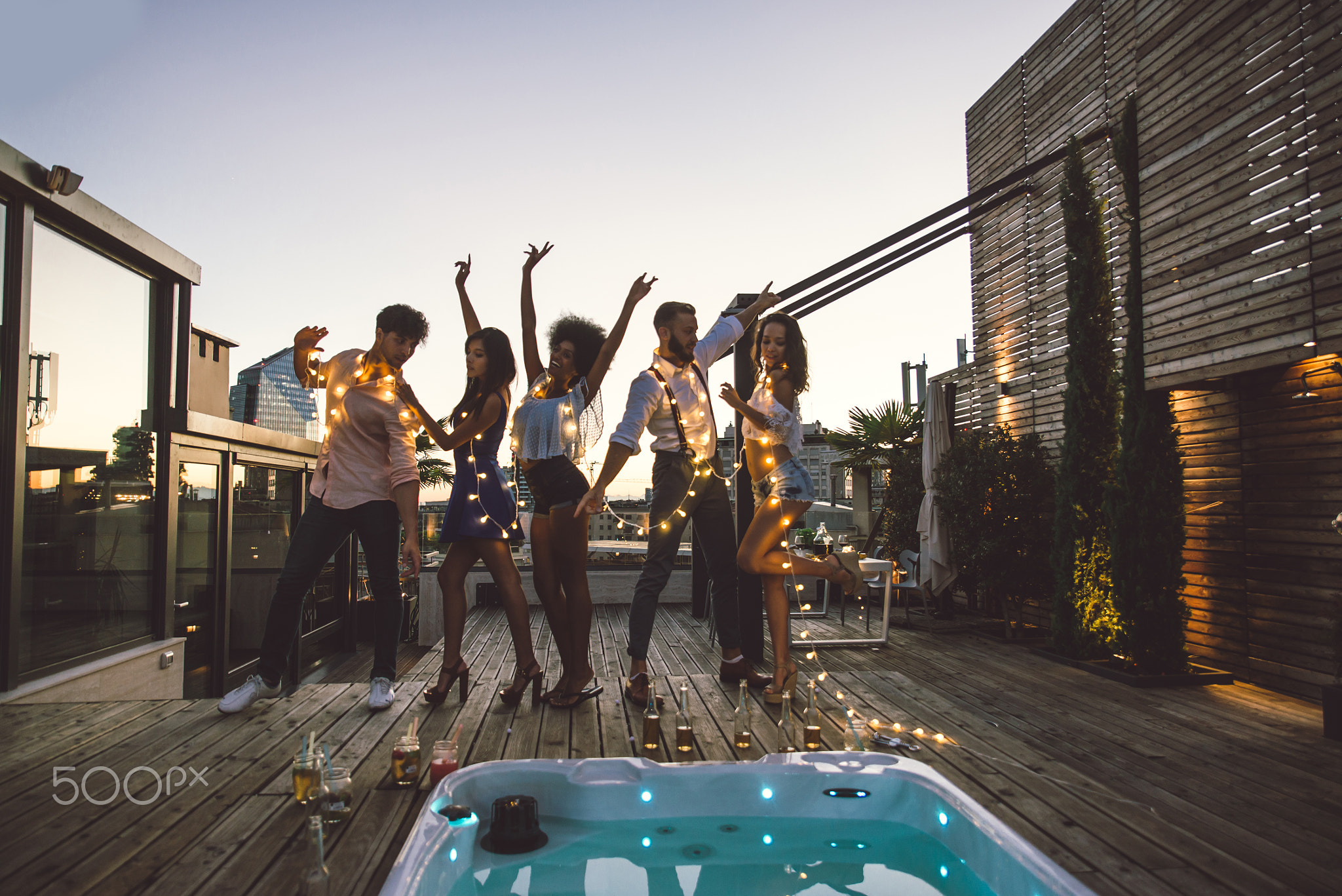 Friends partying on a rooftop