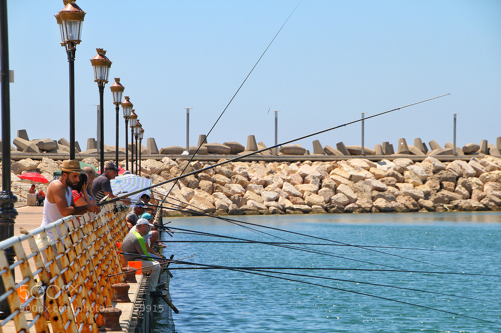Canon EOS 7D sample photo. Fisherman in action photography