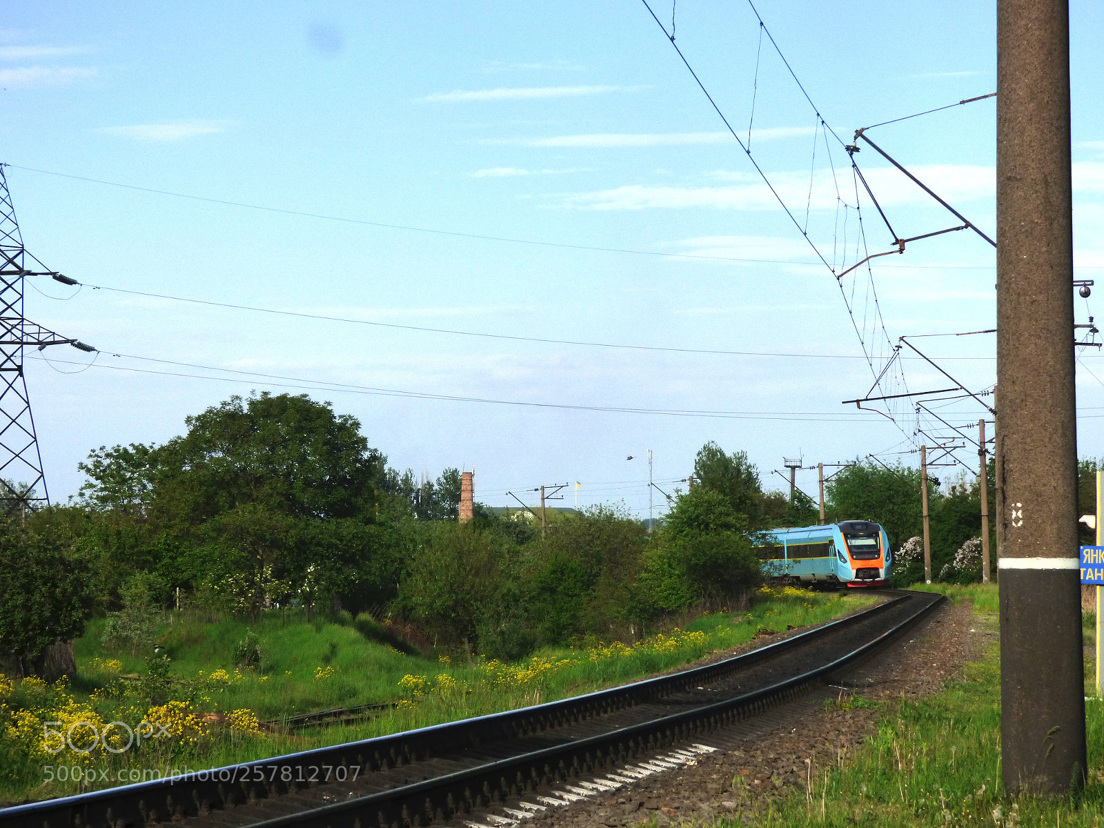 Panasonic Lumix DMC-FZ70 sample photo. A local train in photography
