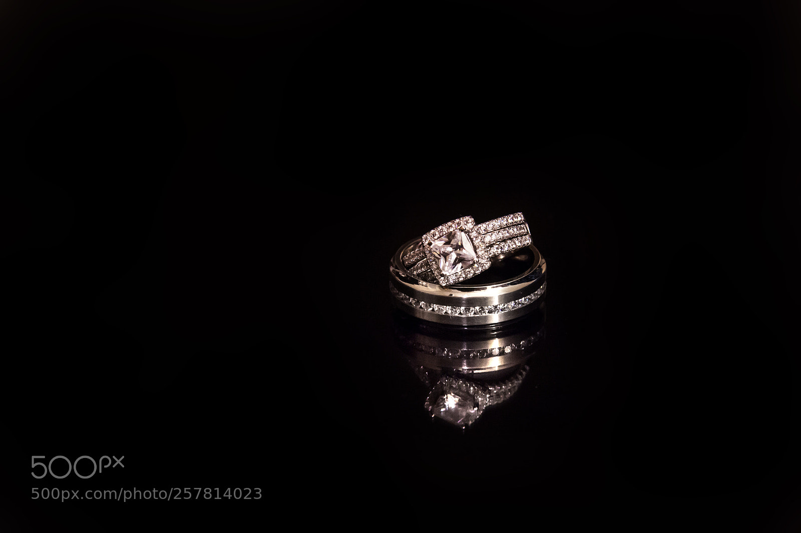 Canon EOS 5D Mark II sample photo. Wedding rings on black photography
