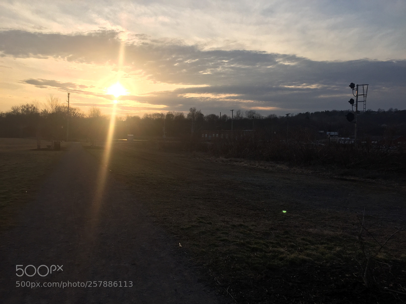 Apple iPhone 6 sample photo. Sun poking thru clouds photography