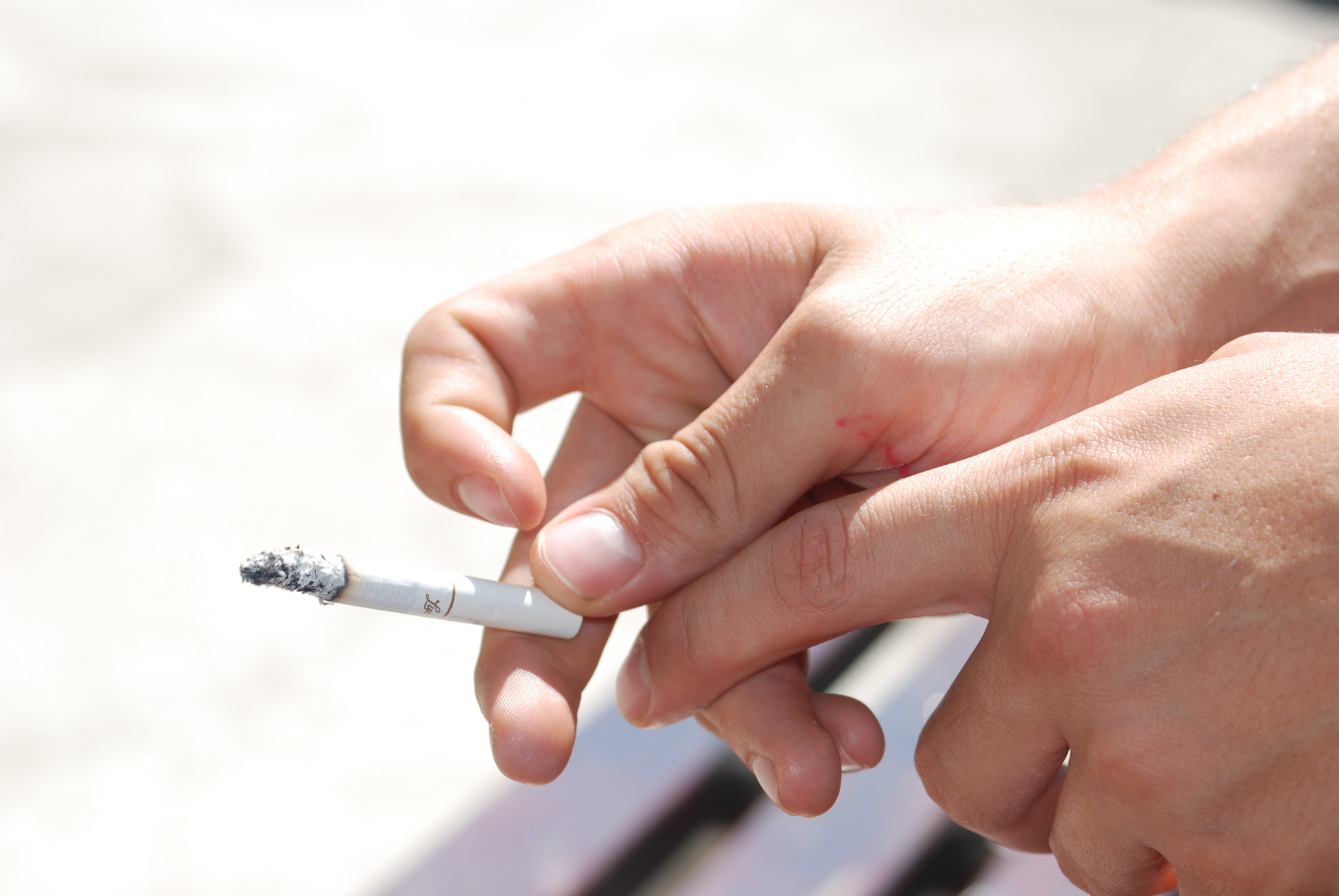 AF Zoom-Nikkor 35-70mm f/3.3-4.5 sample photo. Sunny cigarette photography