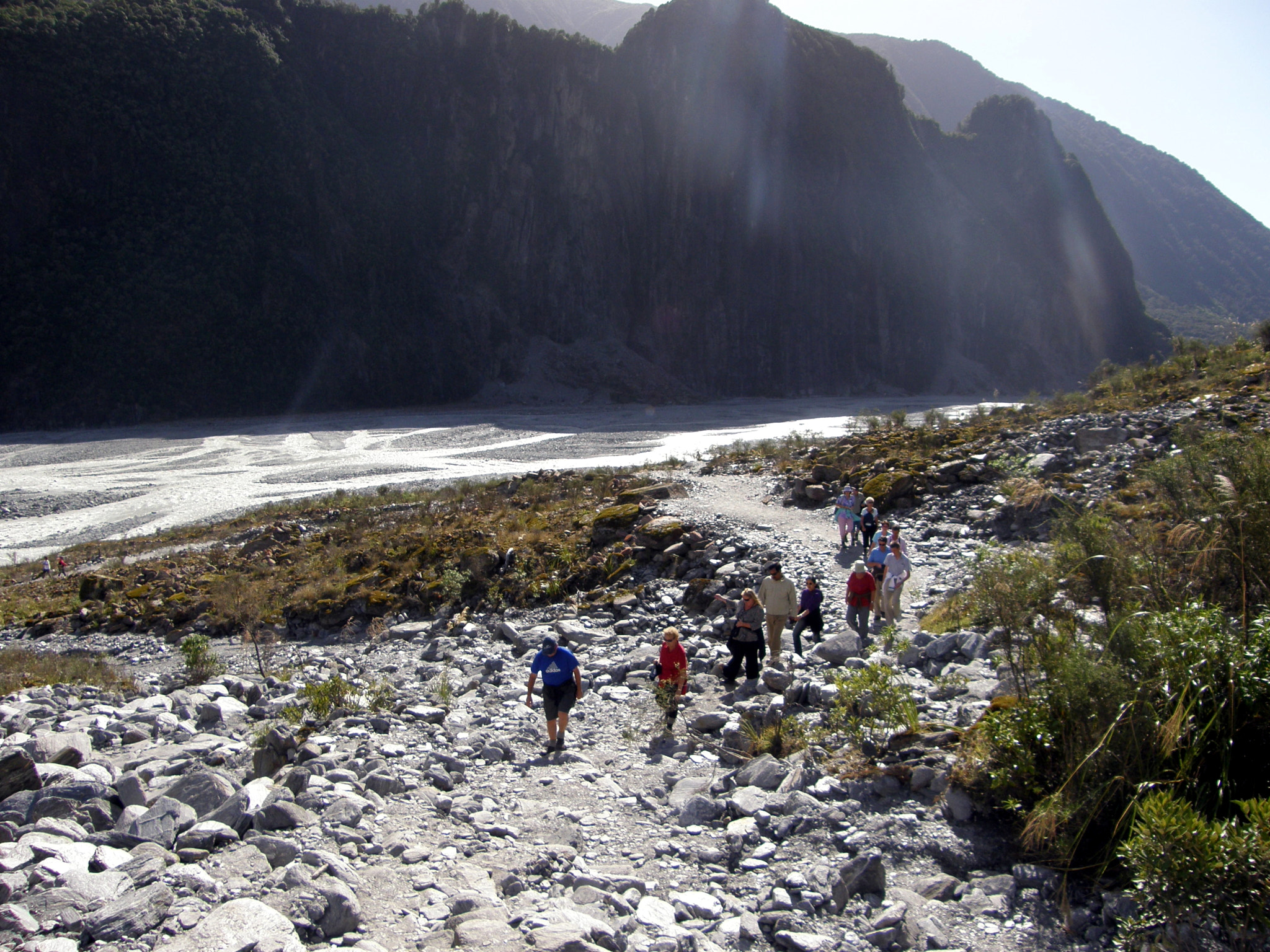 Olympus SP550UZ sample photo. Trekking at the foot of fox glacier. photography