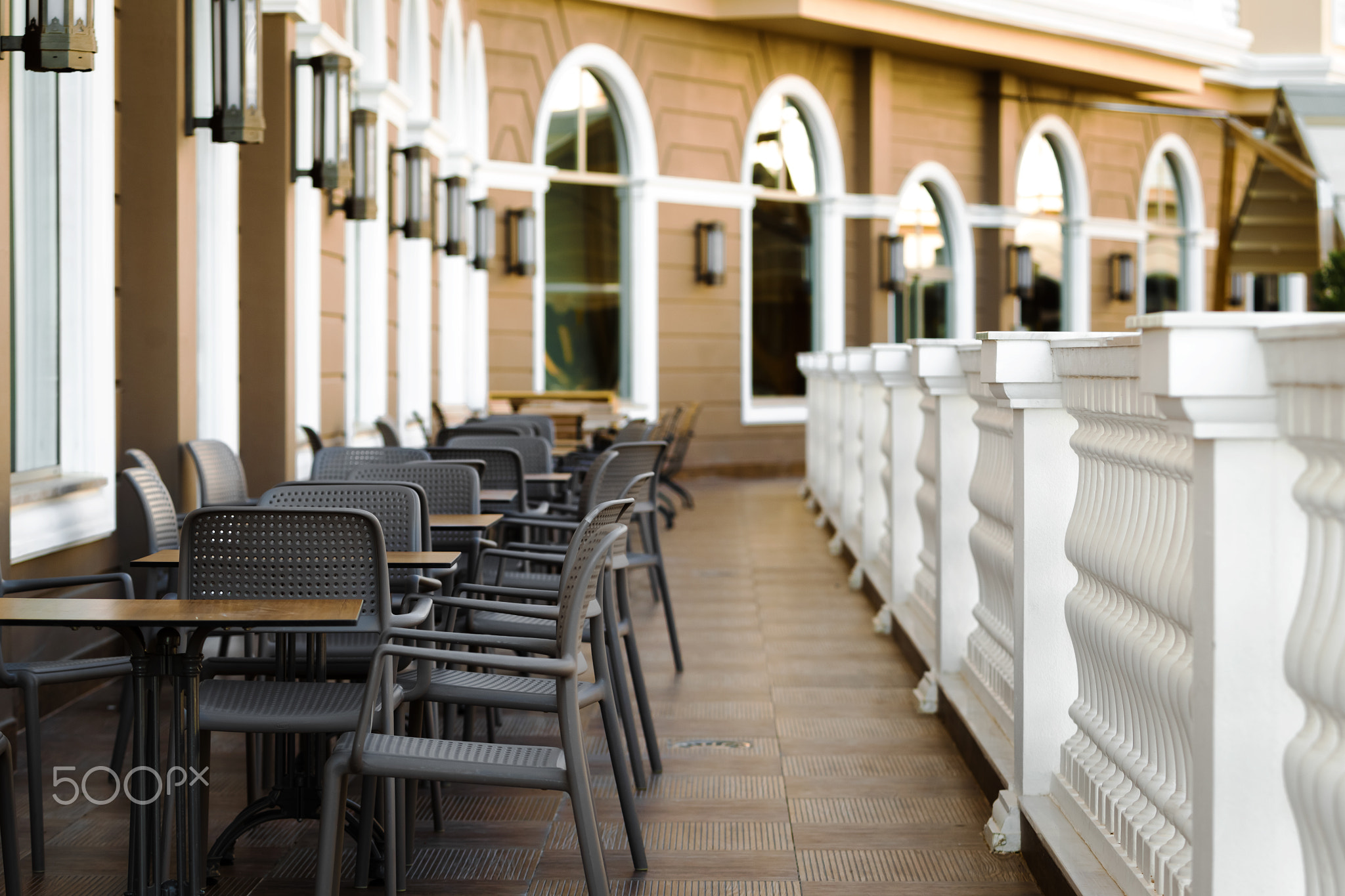 tables and chairs in the restaurant terrace