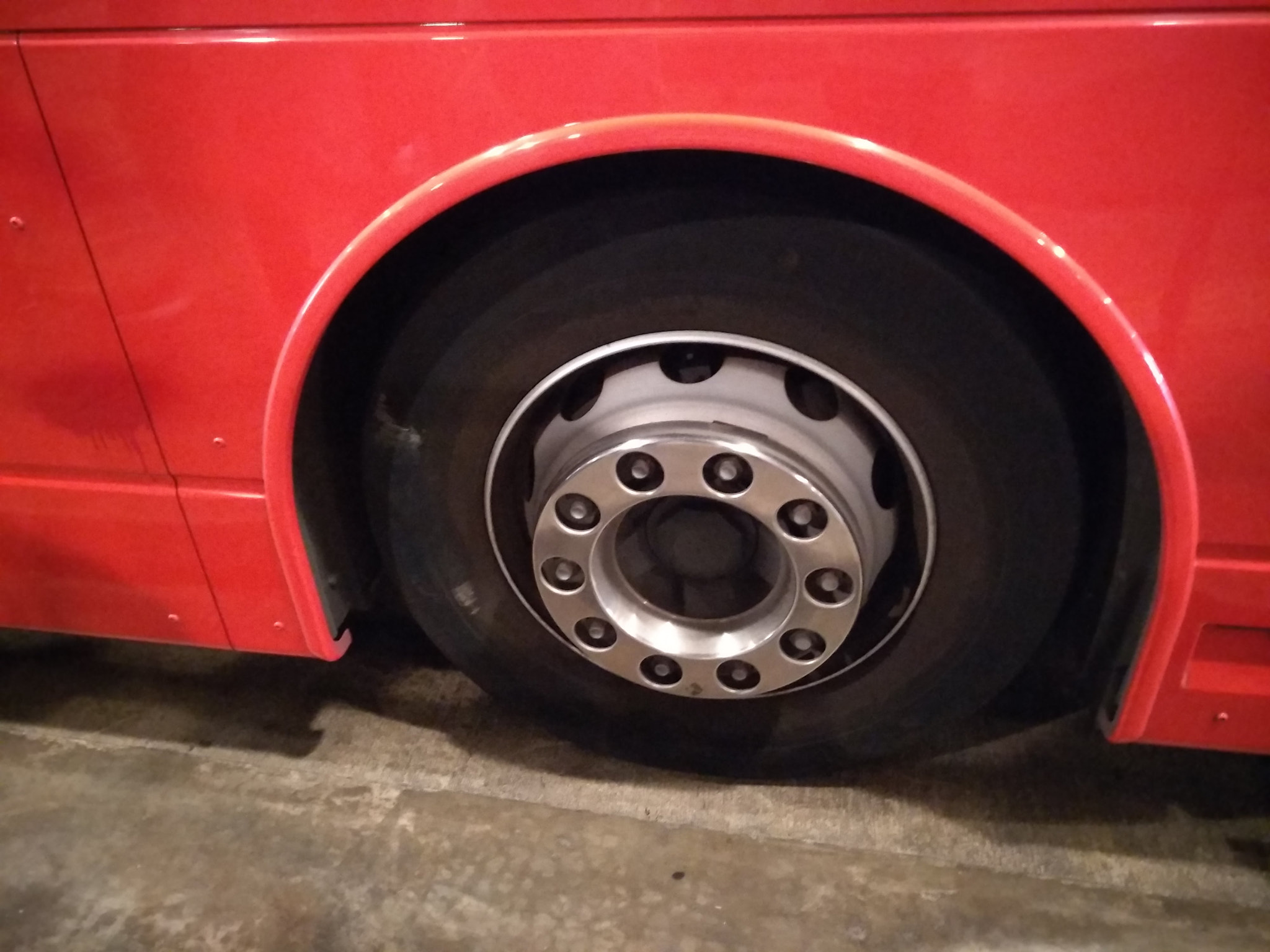 Xiaomi MI MAX 2 sample photo. Car wheel of a red bus photography