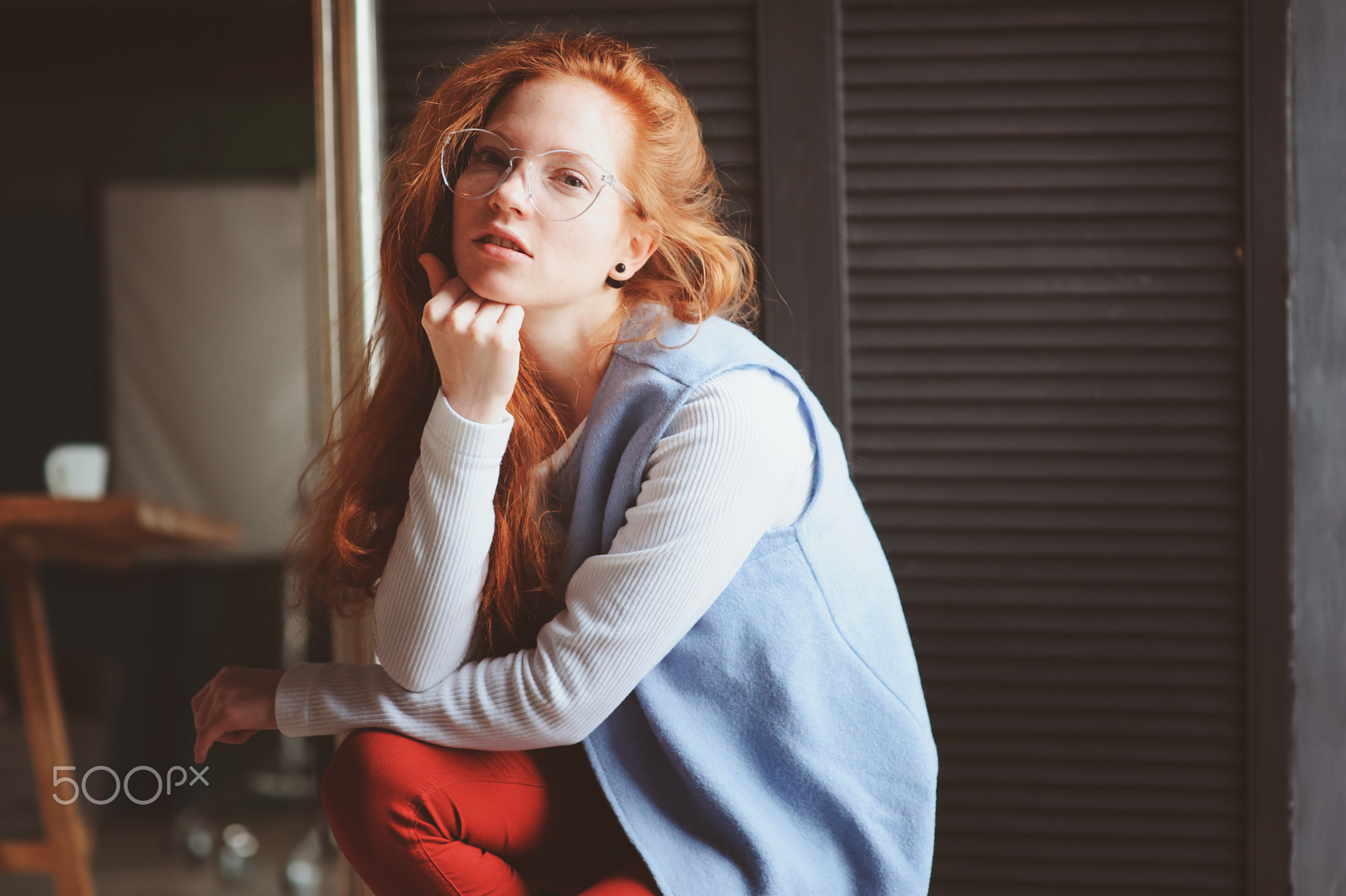 young hipster student woman or creative freelance designer on the work. Morning in home office or...