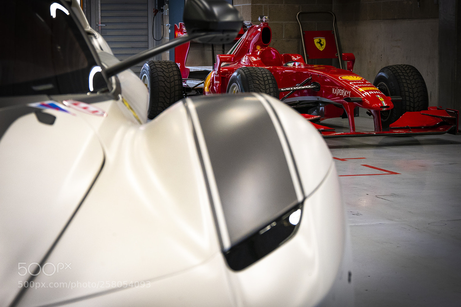 Panasonic Lumix DMC-GX85 (Lumix DMC-GX80 / Lumix DMC-GX7 Mark II) sample photo. Ferrari f1 behind the photography