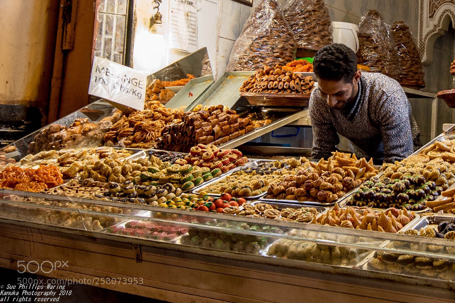 Canon EOS 6D sample photo. Very excited shop keeper photography