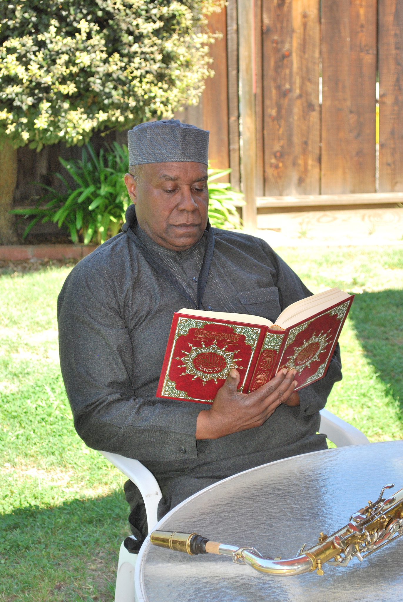 Nikon D60 sample photo. Muslim musician reading. photography