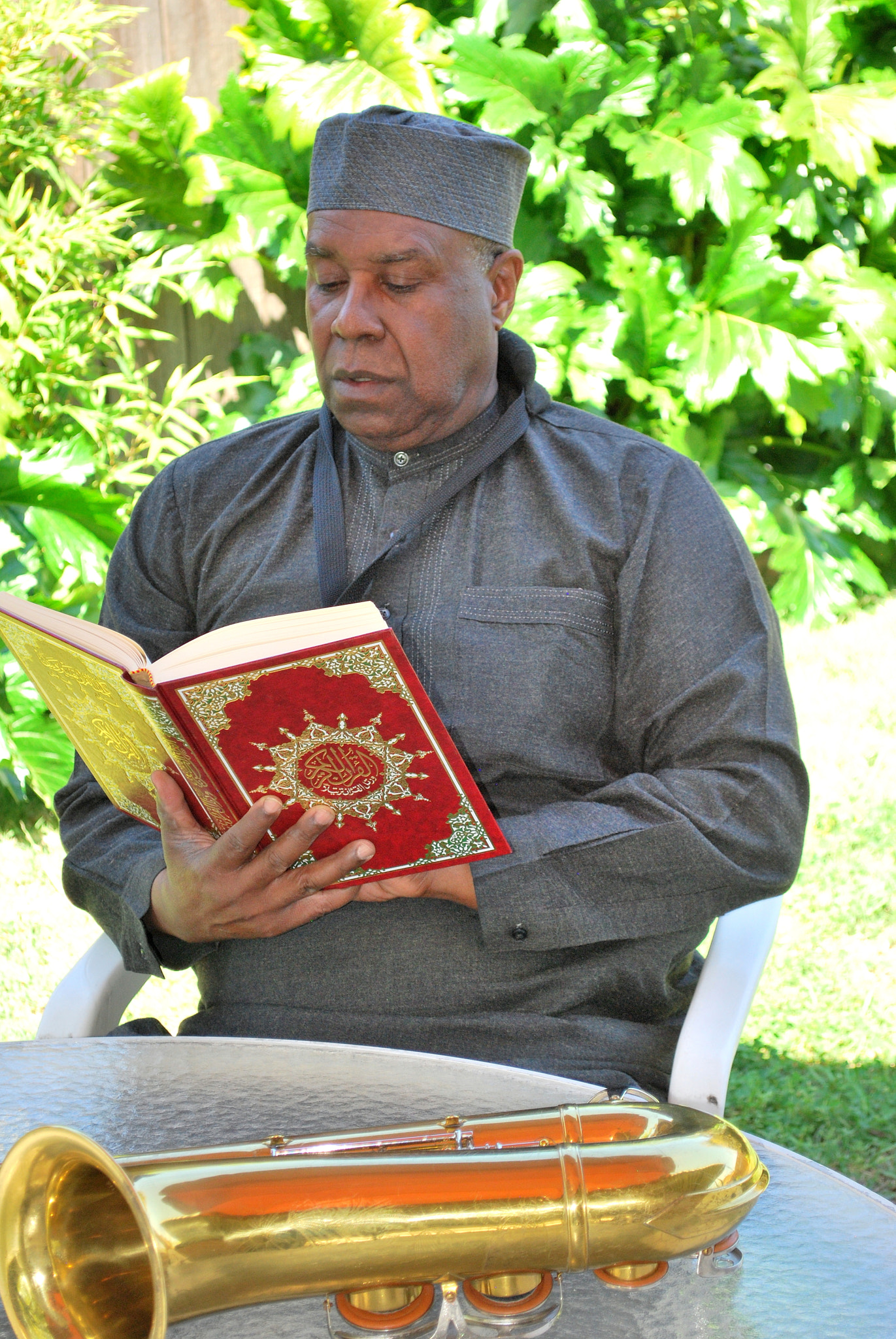 Nikon D60 sample photo. Muslim musician reading. photography
