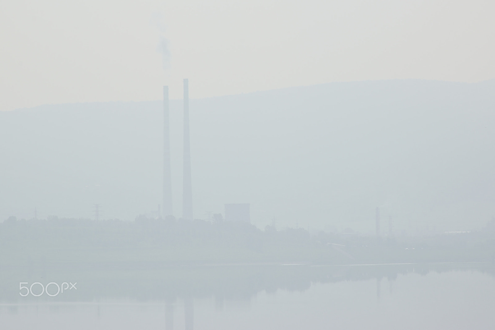 Nikon D5300 sample photo. Strong foggy above new lake named milada during spring morning with power plant on background photography