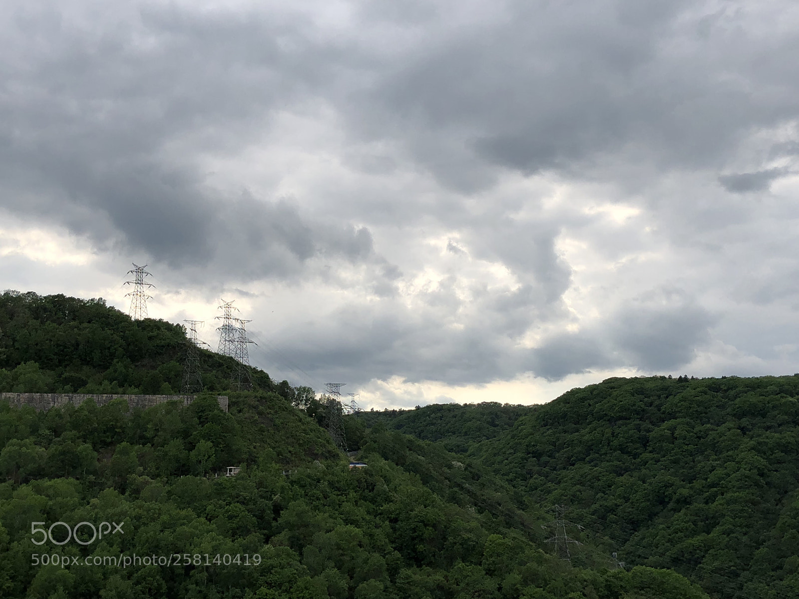 Apple iPhone X sample photo. Clouds gather, driven by photography