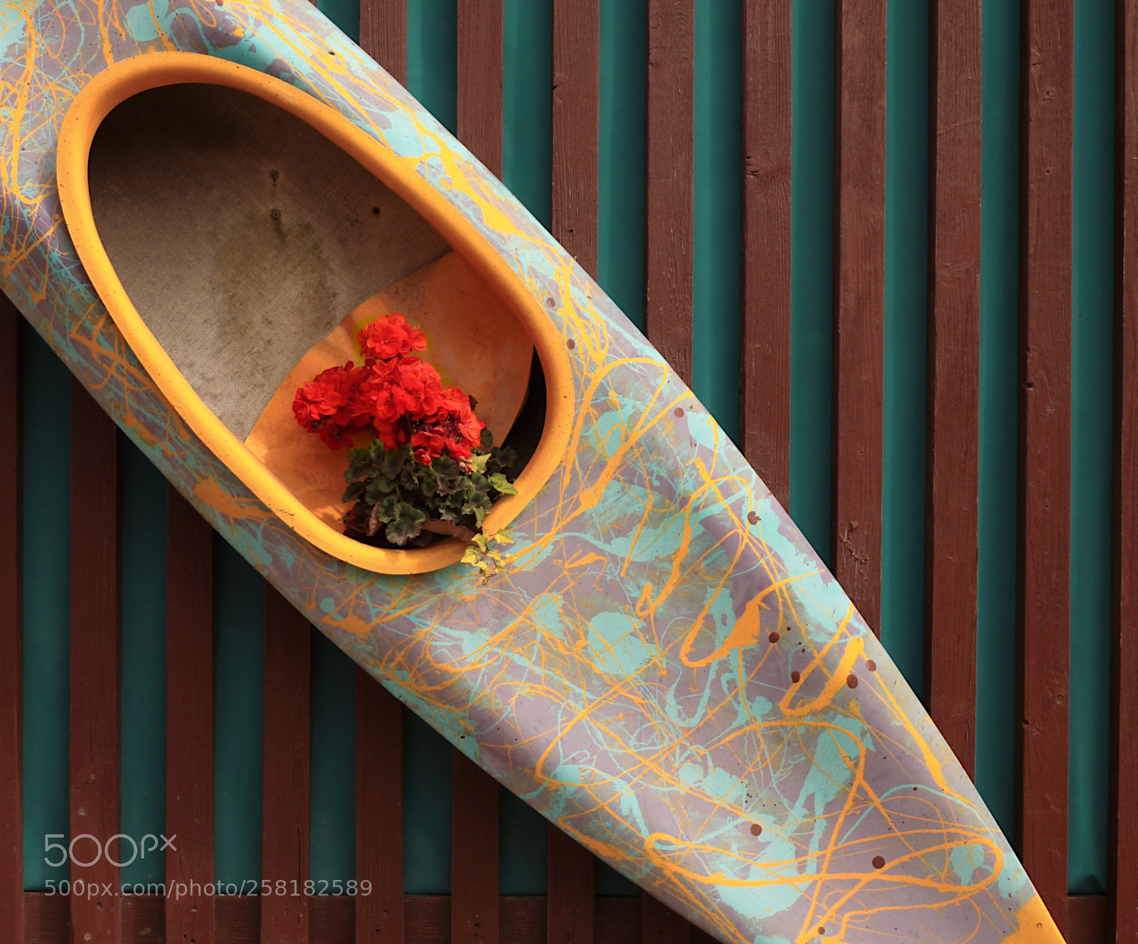 Panasonic DMC-TZ7 sample photo. Flowers in a canoe photography