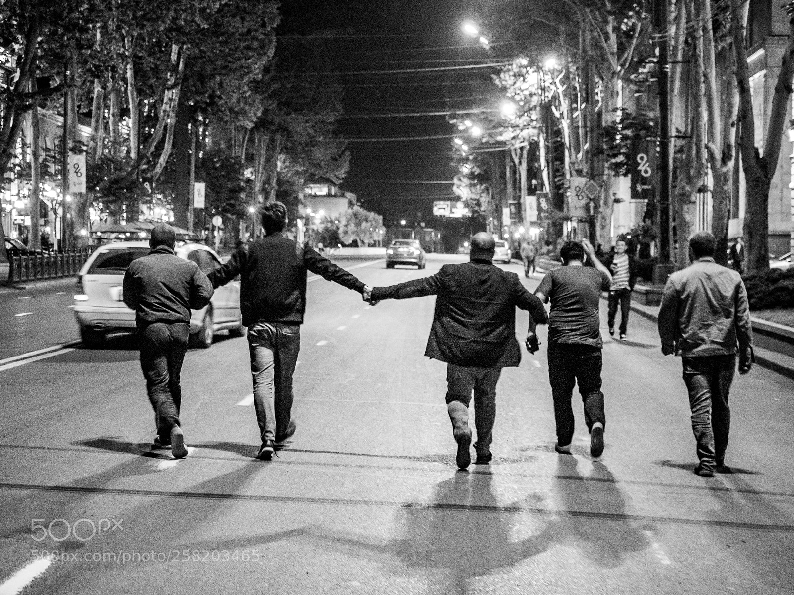 Olympus OM-D E-M5 II sample photo. Nationalists walking home after photography