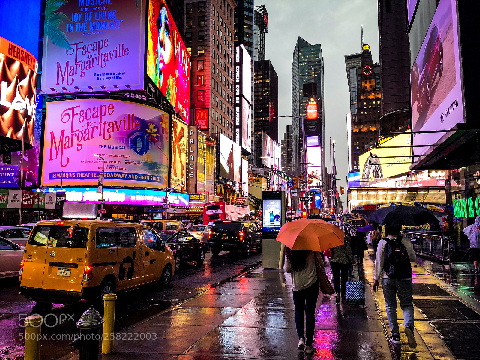 Apple iPhone X sample photo. Rainy times square  photography