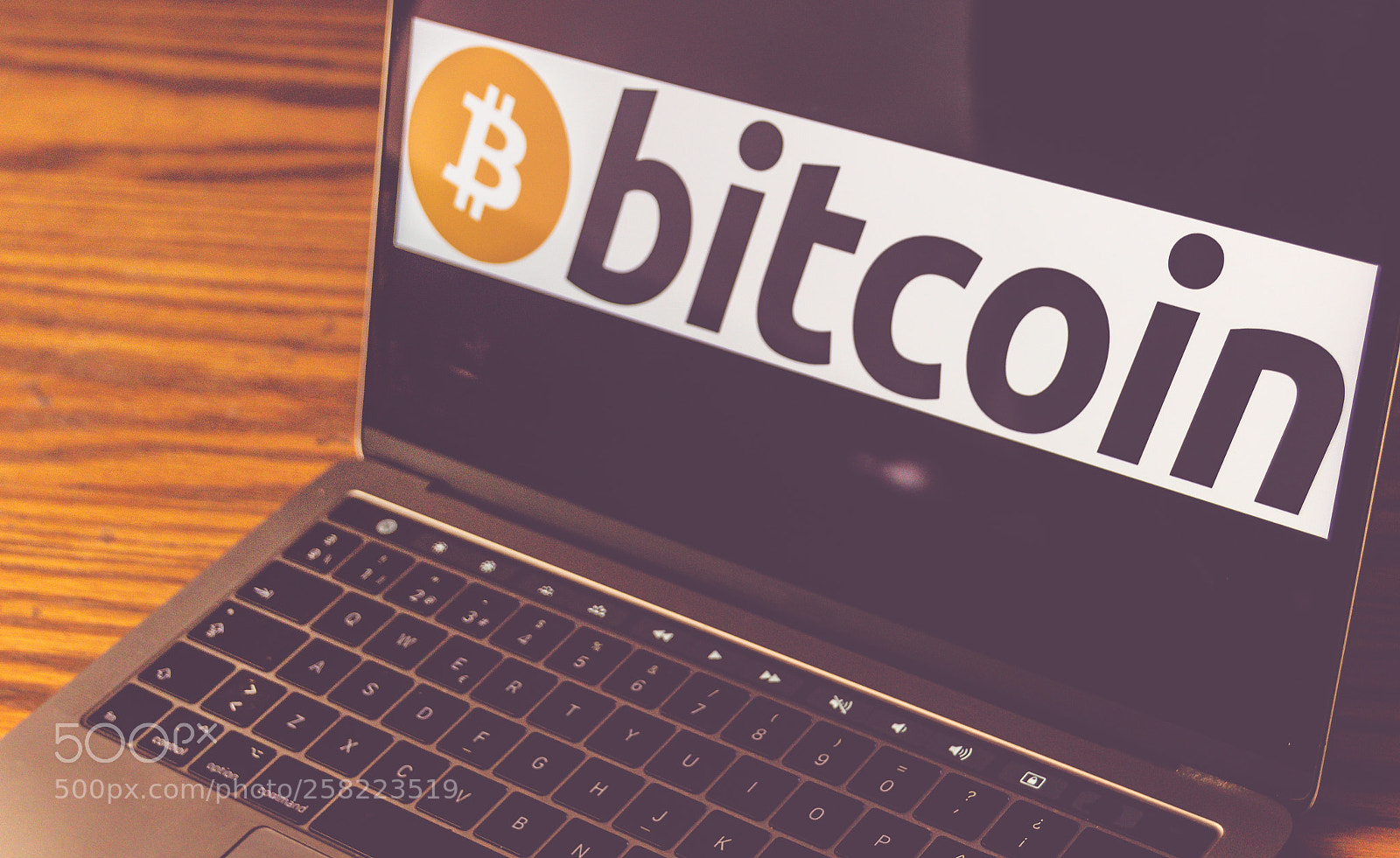 Canon EOS 1200D (EOS Rebel T5 / EOS Kiss X70 / EOS Hi) sample photo. Bitcoin logo on computer photography