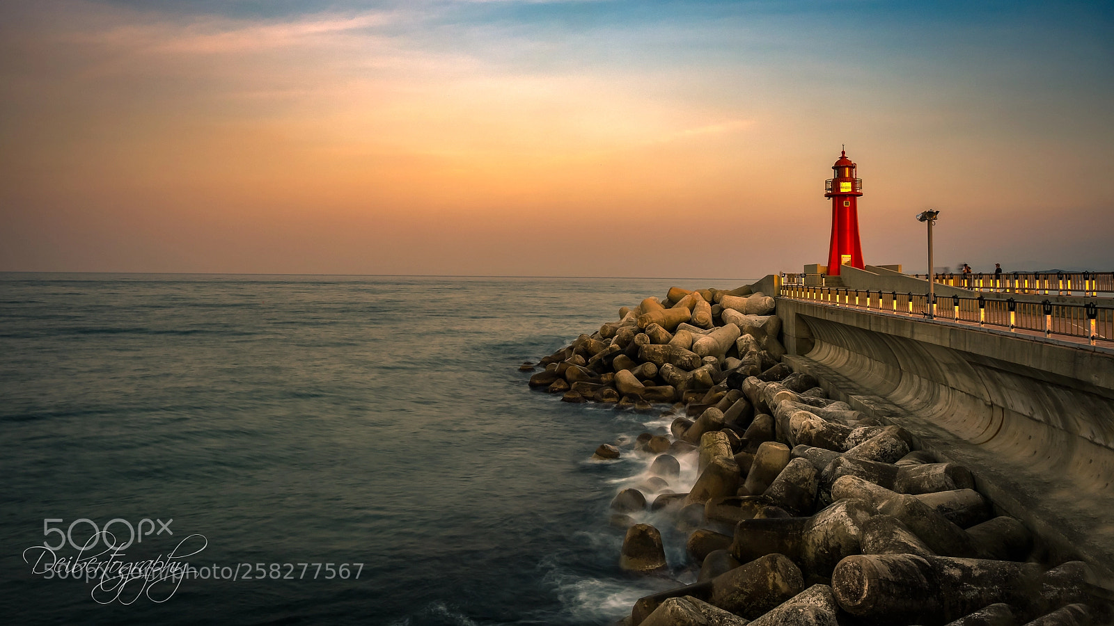 Olympus OM-D E-M1 sample photo. Red lighthouse at sunset photography