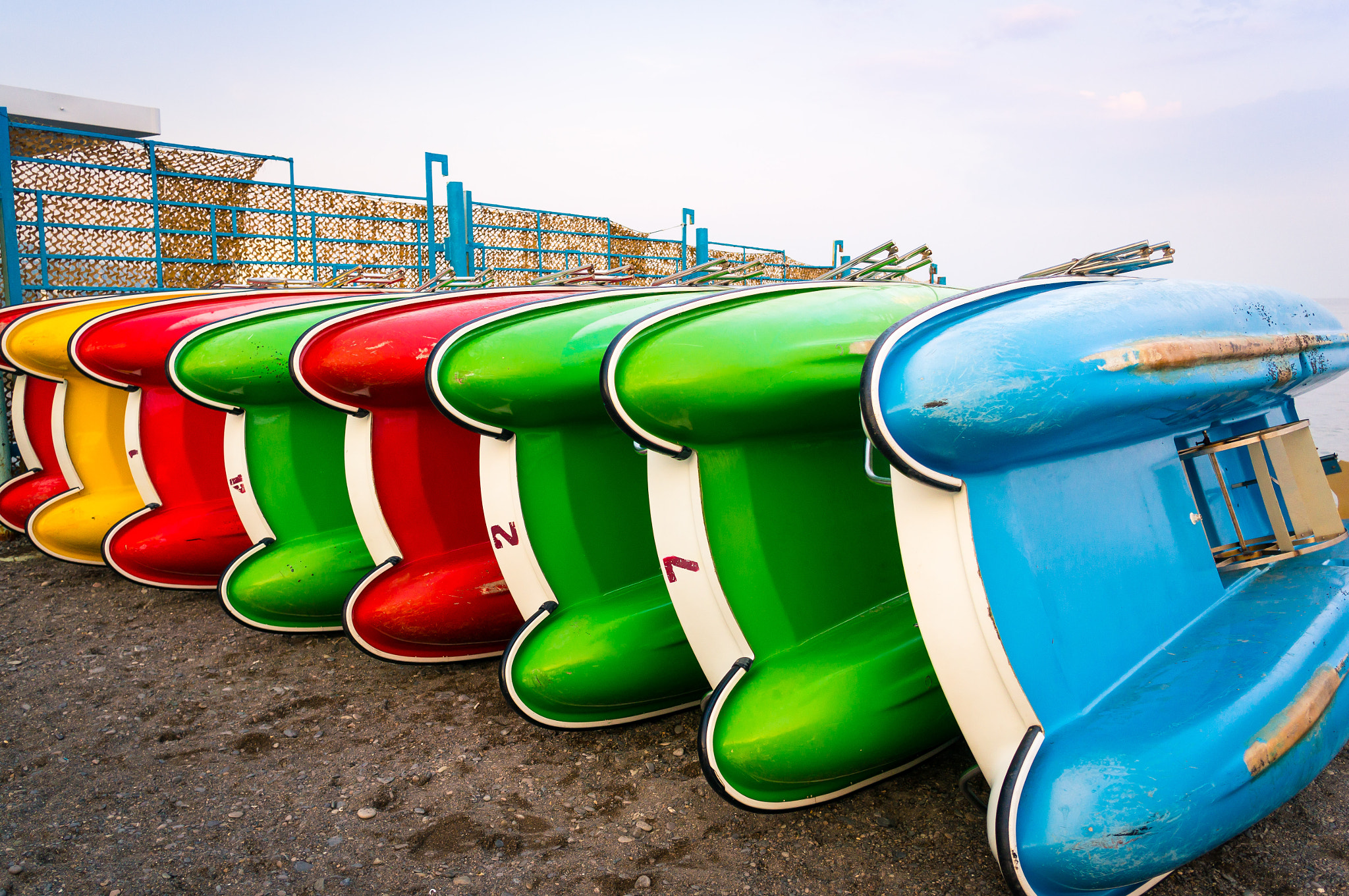 Sony Alpha NEX-5R sample photo. Boats on the beach photography