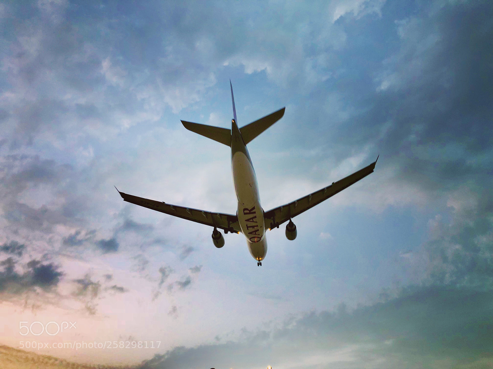 Apple iPhone X sample photo. Wings under the clouds photography