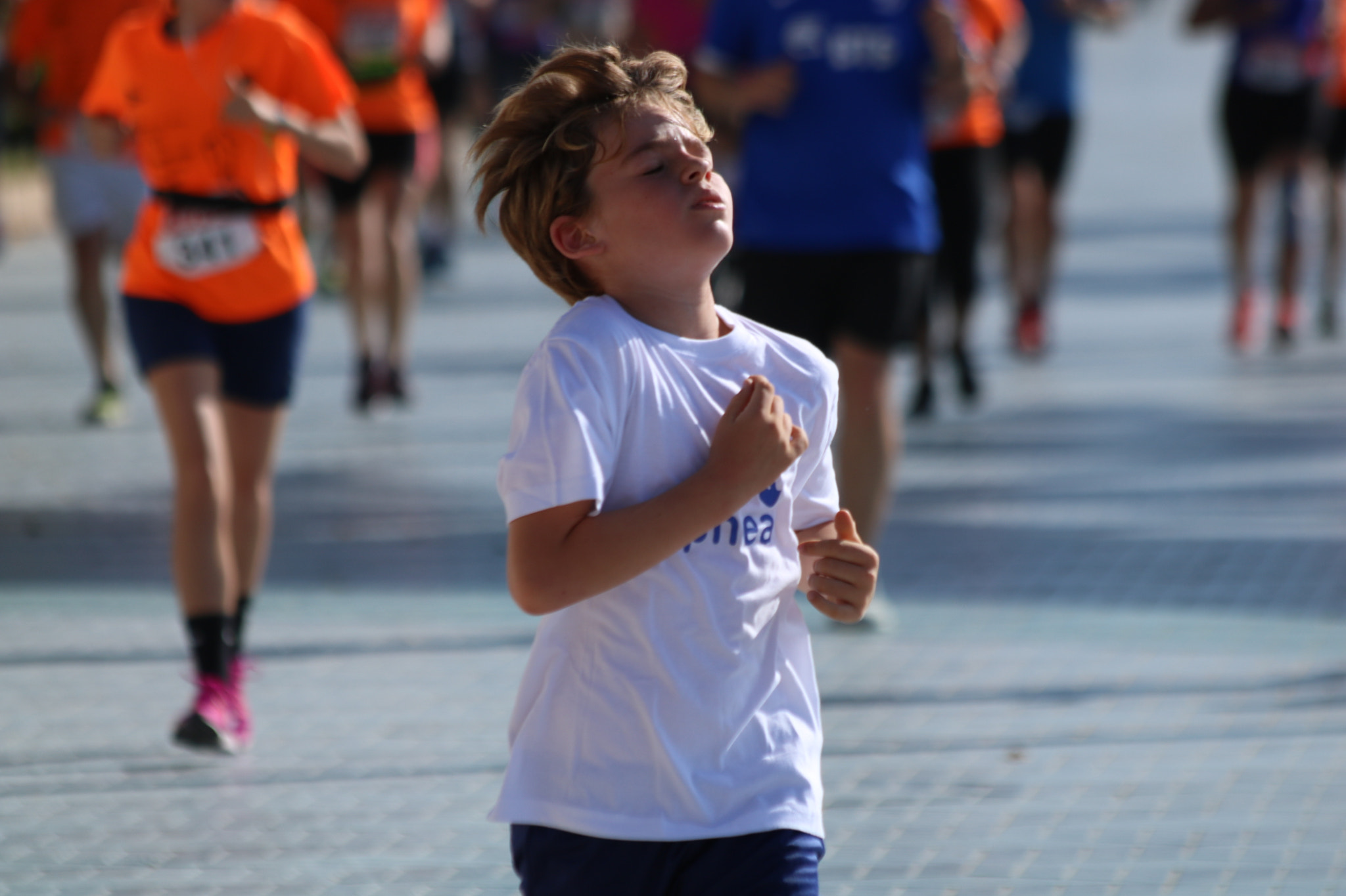 Canon EF 70-300mm F4-5.6 IS USM sample photo. Marathon runners photography