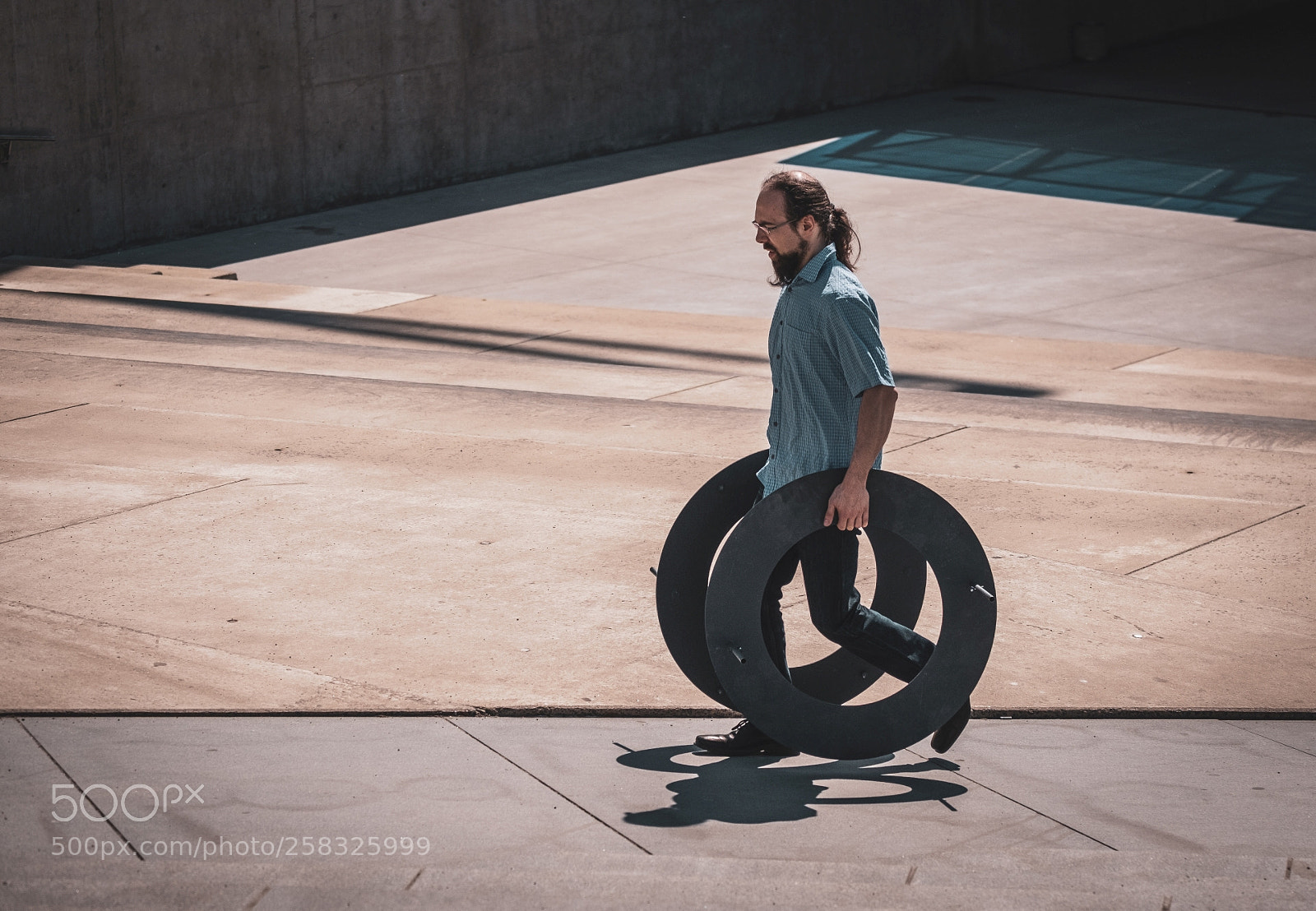 Fujifilm X-T20 sample photo. Man with wheels photography