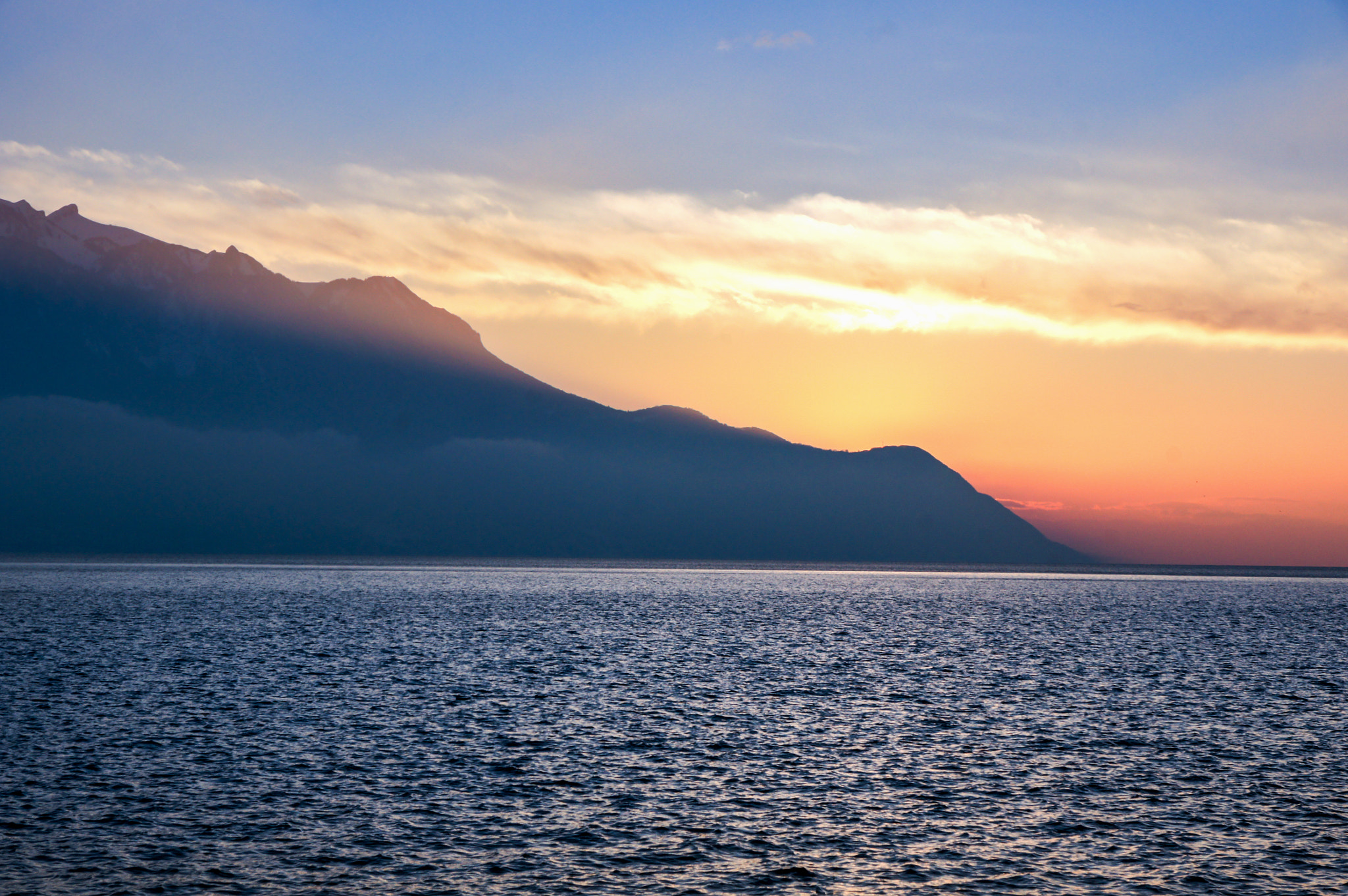 Sony Alpha DSLR-A550 sample photo. Silhouetted mountains at sunset. photography