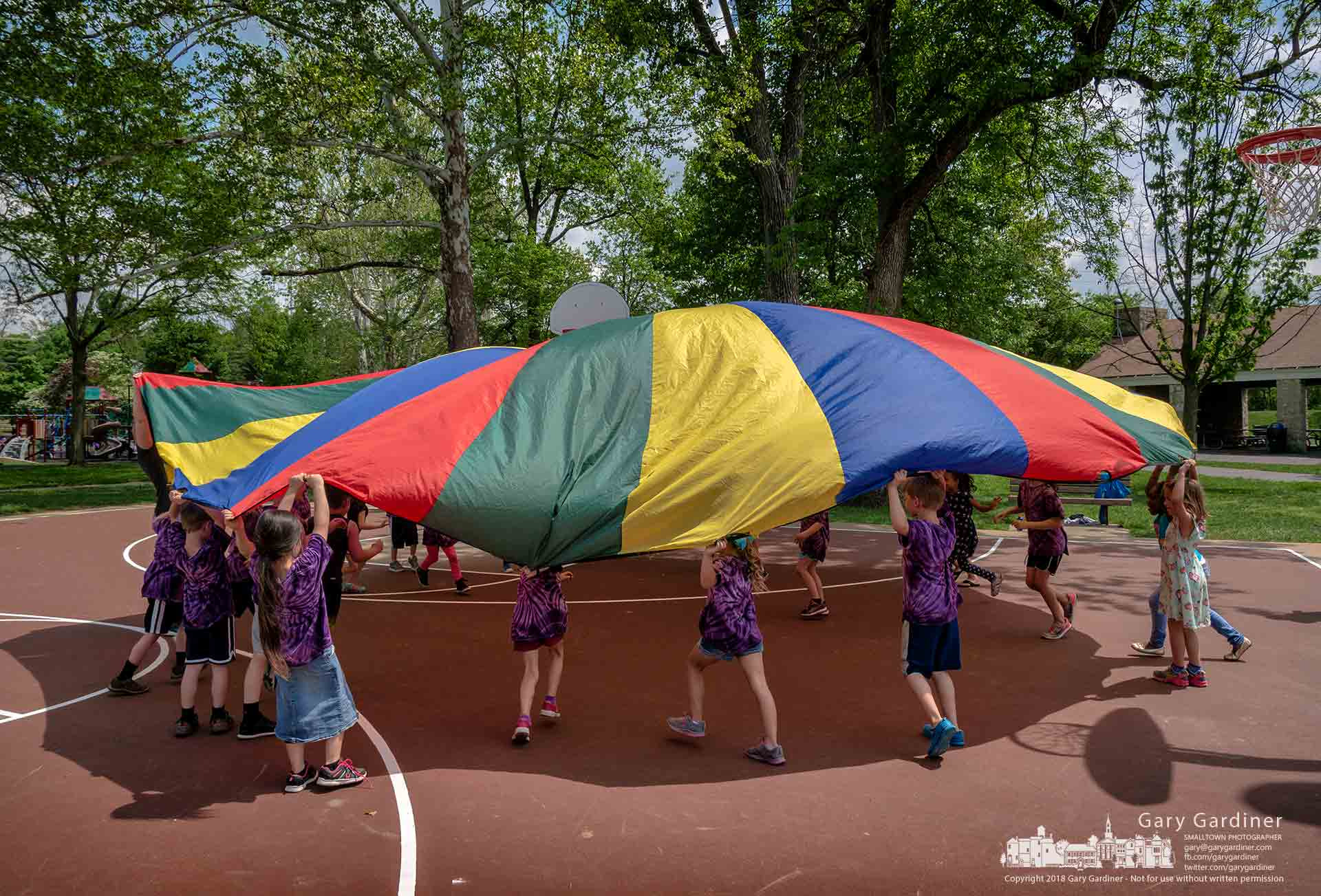 Panasonic Lumix DMC-G85 (Lumix DMC-G80) sample photo. Rainbow parachute fun at the park photography
