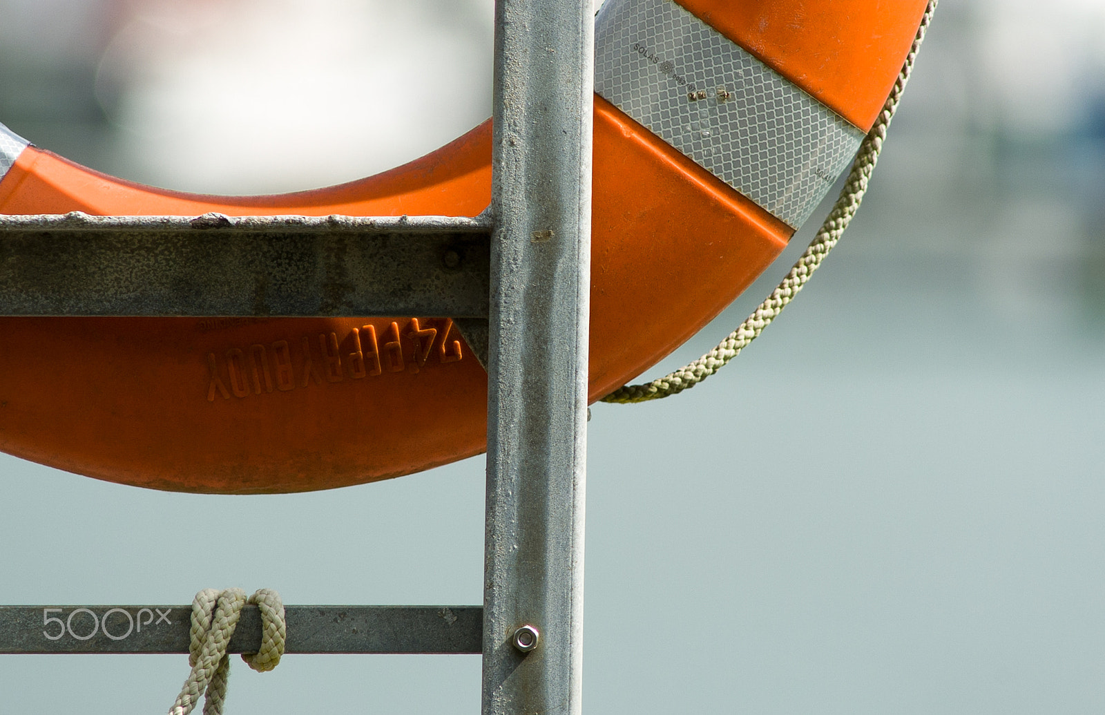 Nikon D2H sample photo. Life buoy abstract photography