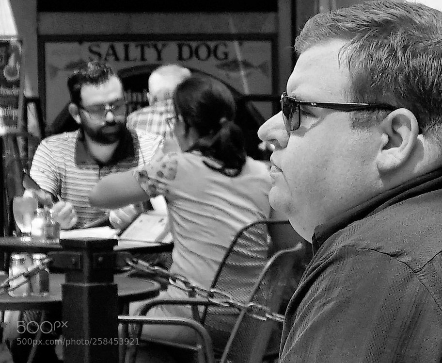 Sony a6500 sample photo. A man sitting at photography