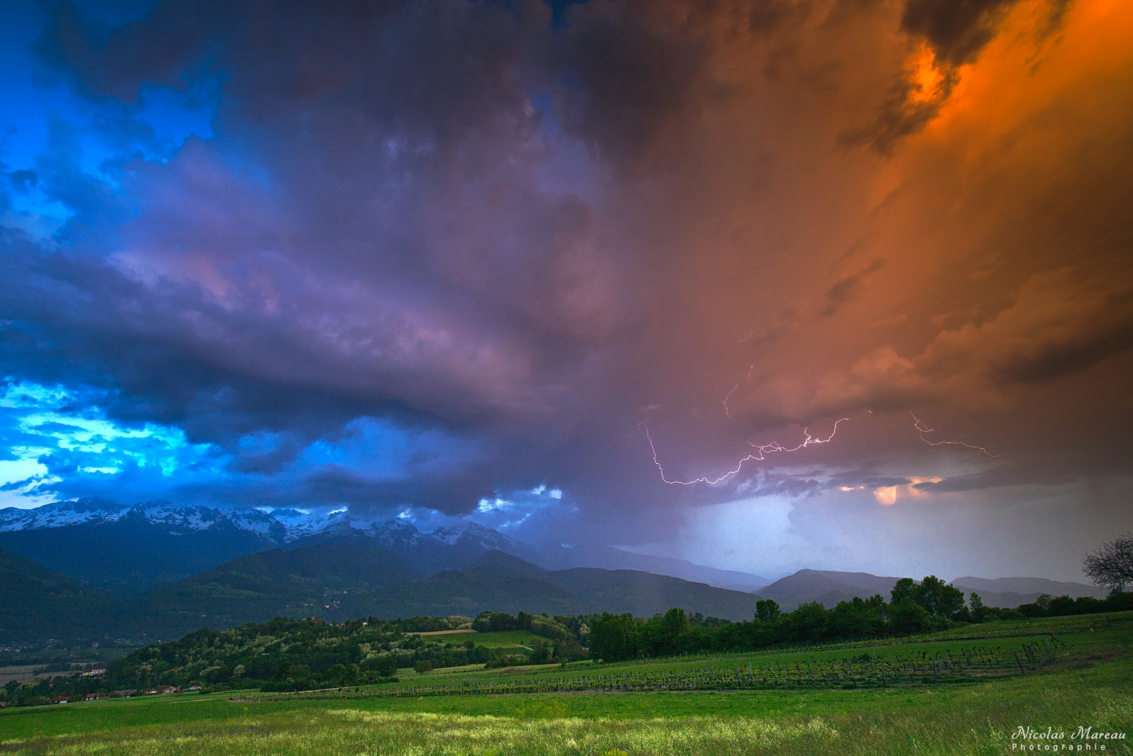 Canon EF 16-35mm F4L IS USM sample photo. Lightning at sunset photography