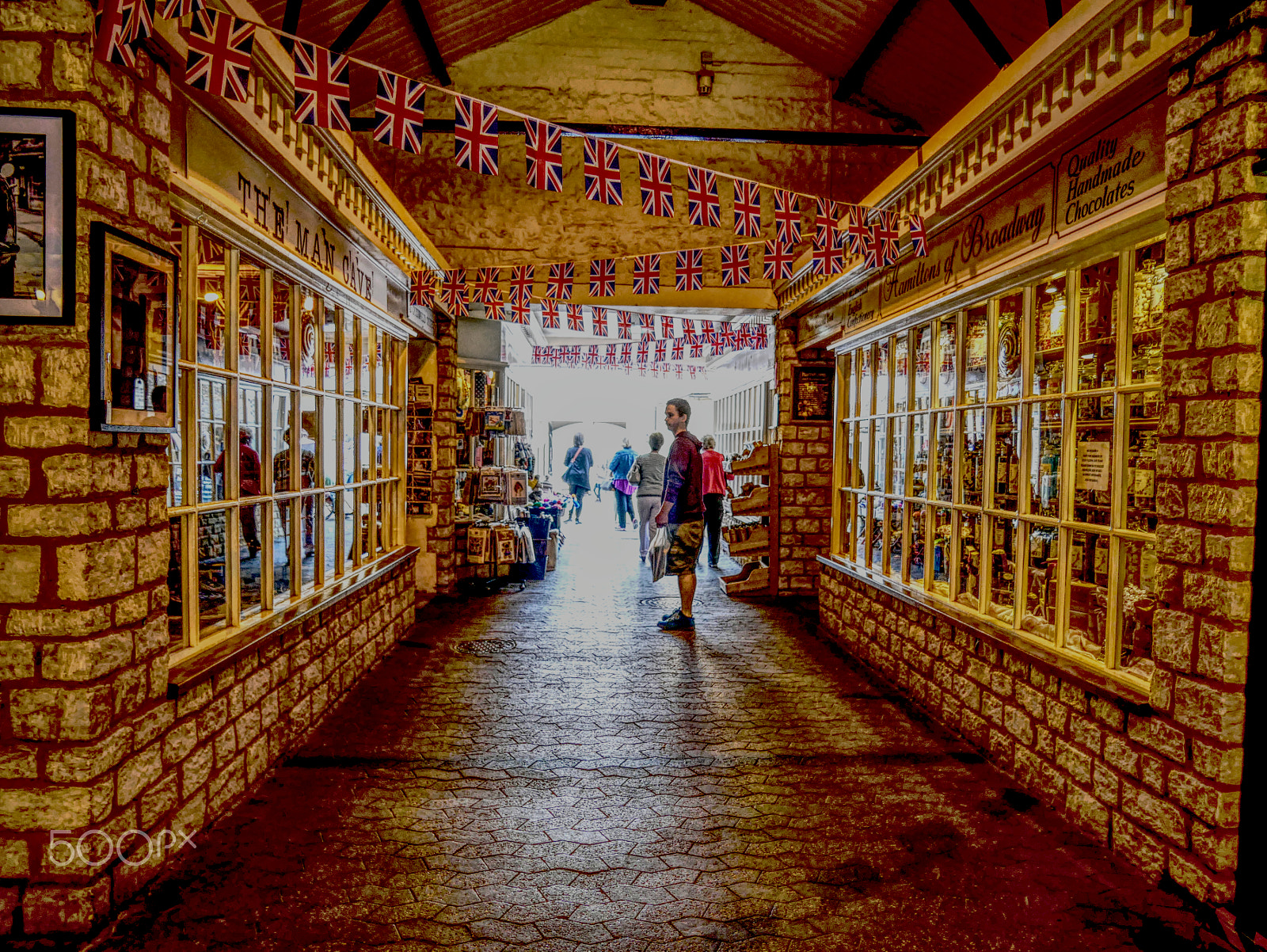 Panasonic Lumix DMC-G85 (Lumix DMC-G80) sample photo. Olde english arcade wedding bunting photography