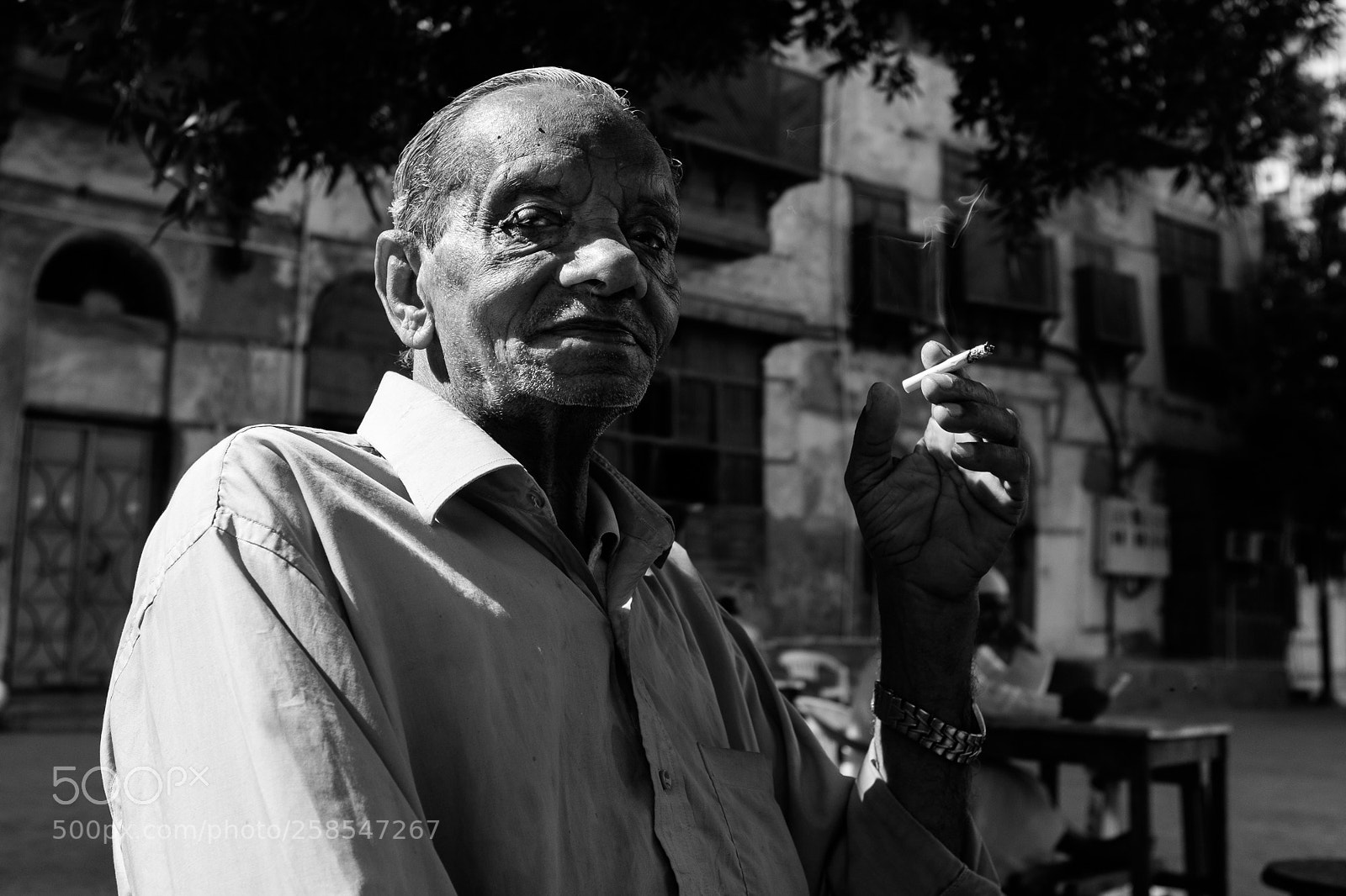 Fujifilm X100S sample photo. Smoker photography