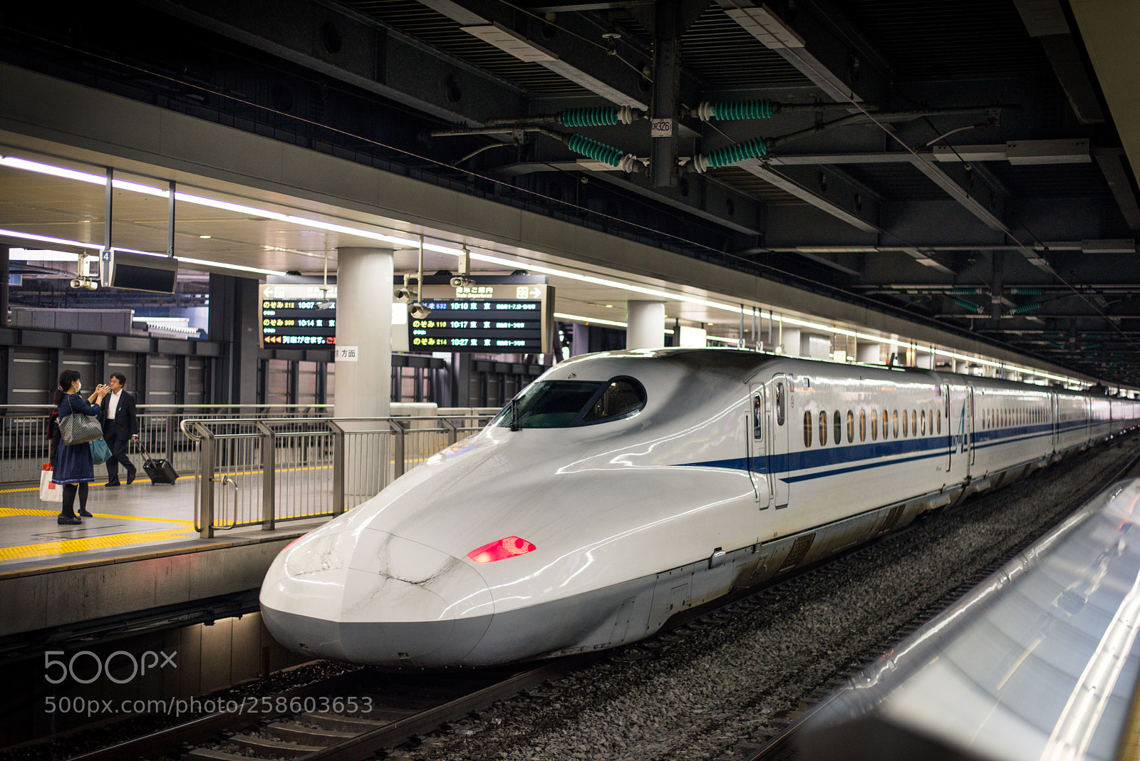 Nikon D610 sample photo. Shinkansen train stopping at photography