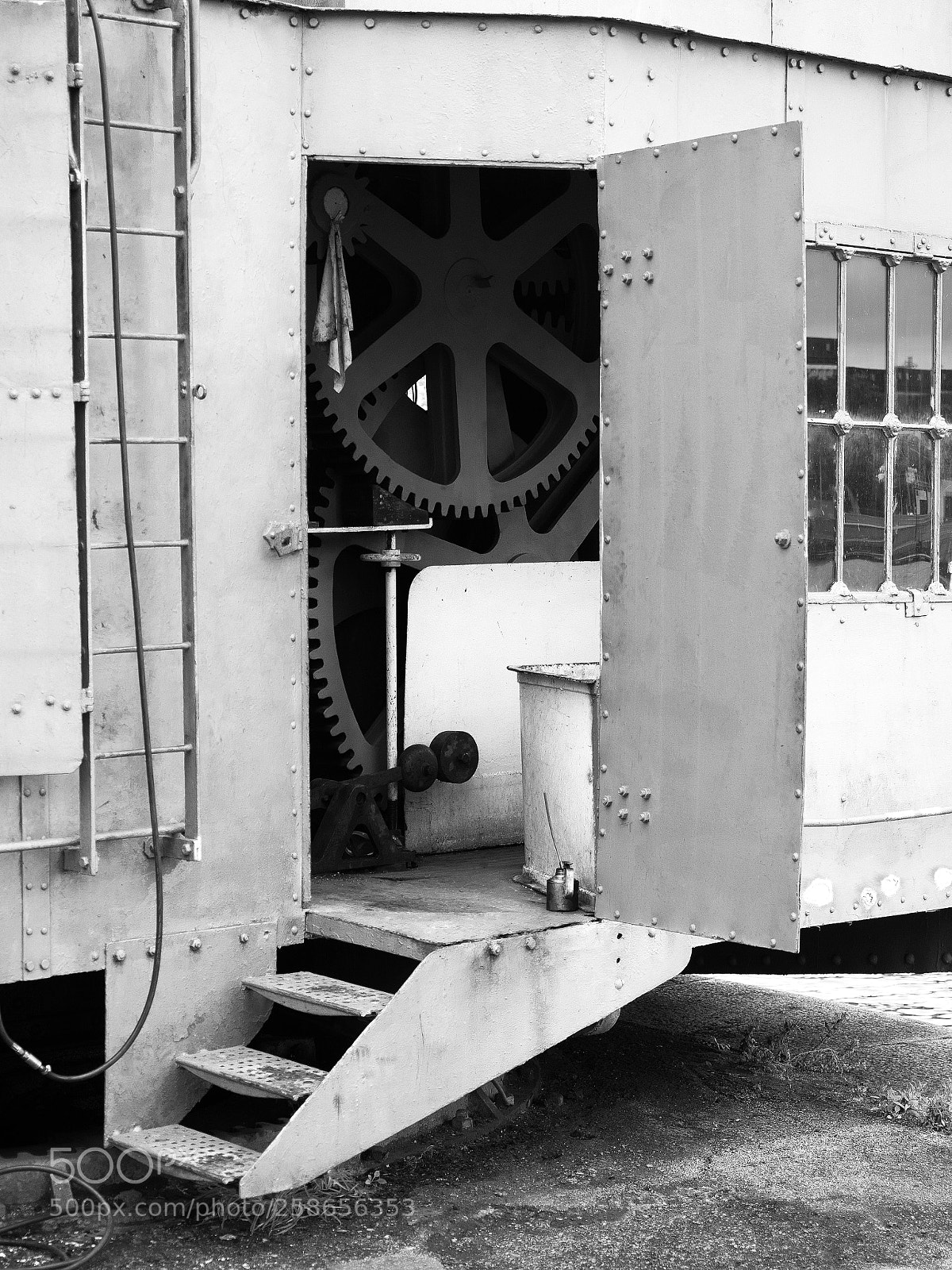 Olympus OM-D E-M5 II sample photo. Door and cogs photography