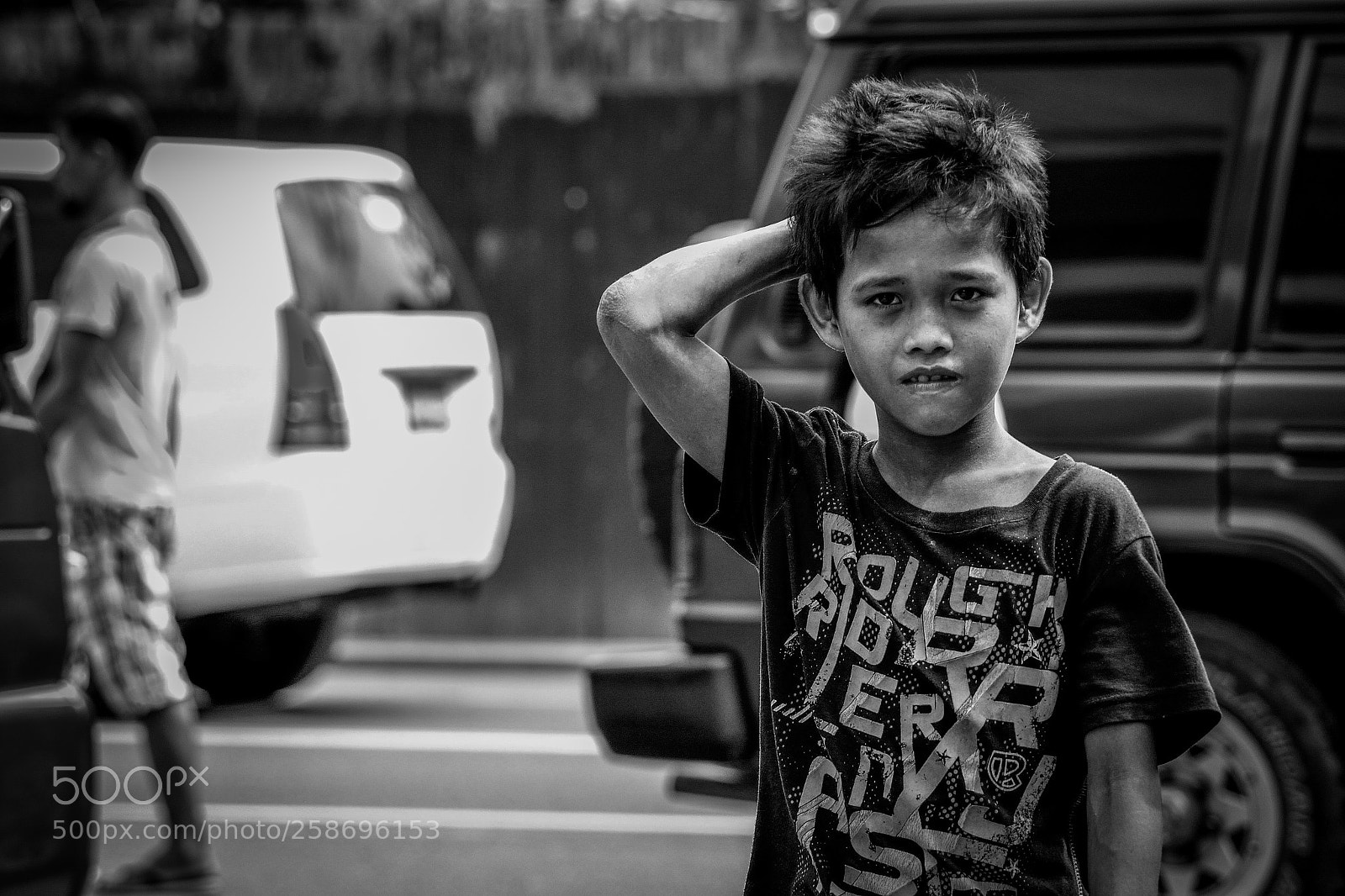 Nikon D3100 sample photo. Boy in the street photography