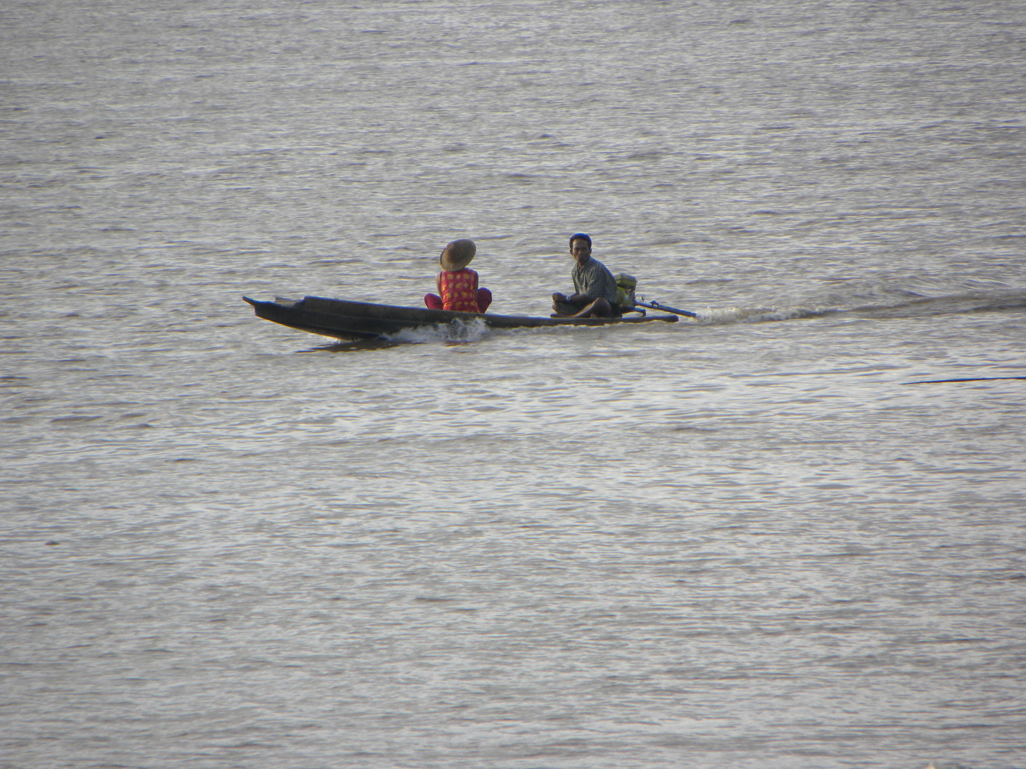 Nikon Coolpix P90 sample photo. Boatman in red photography