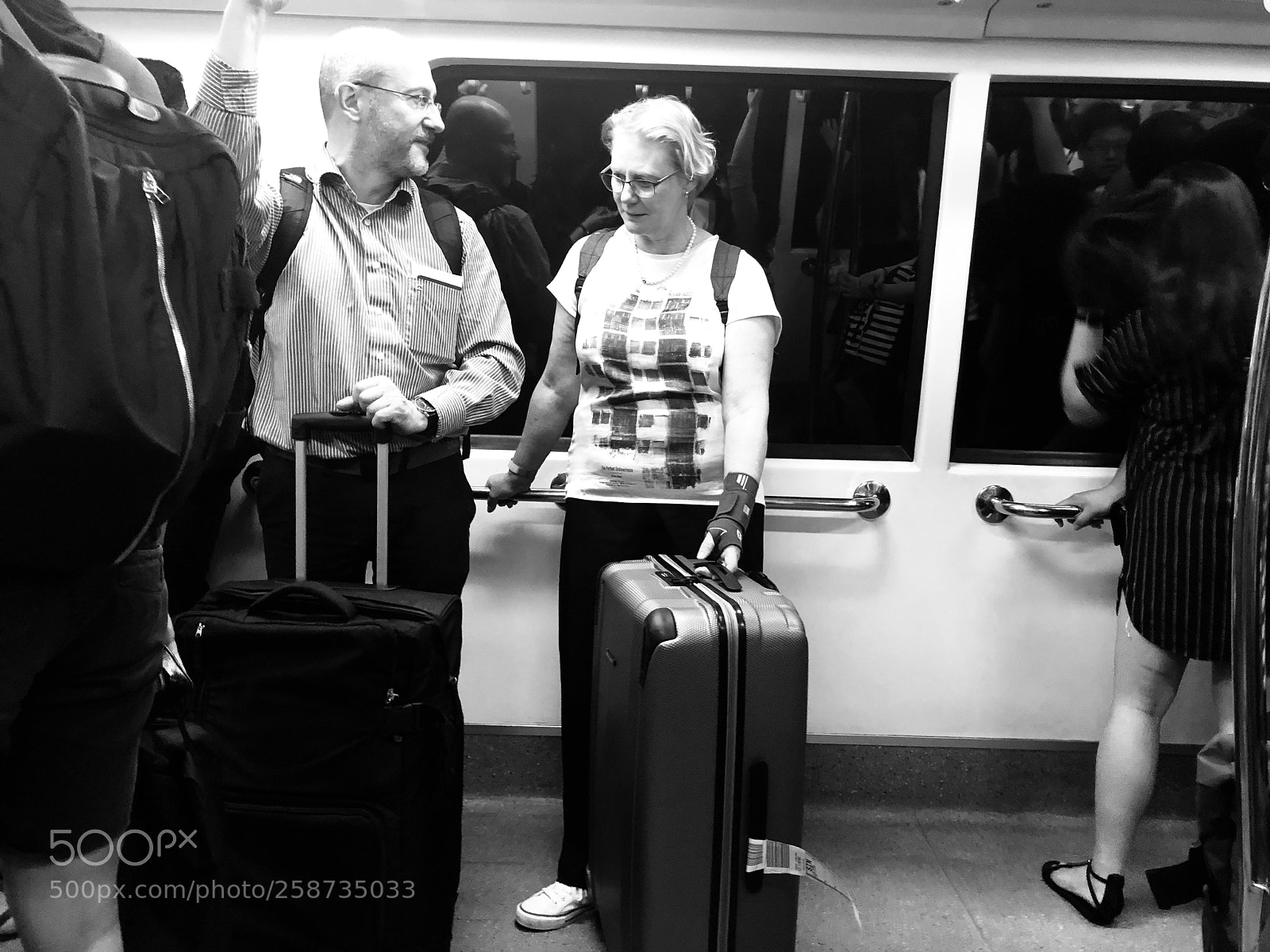 Apple iPhone X sample photo. Subway conversation photography