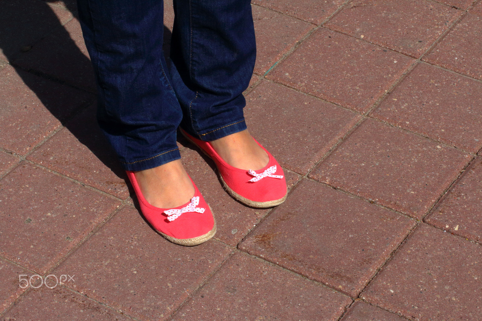 Canon EF-S 60mm F2.8 Macro USM sample photo. Legs of the girl in jeans and slippers photography