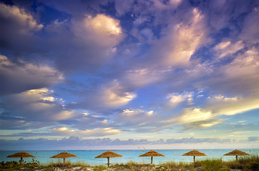 Leica M9 sample photo. Reed umbellas and sunrise clouds. turks and caicos. providenciales photography