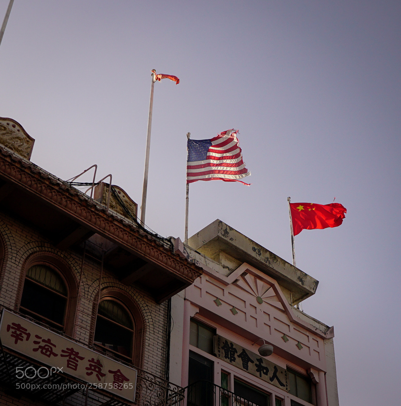 Sony a6000 sample photo. 2 flags in chinatown photography