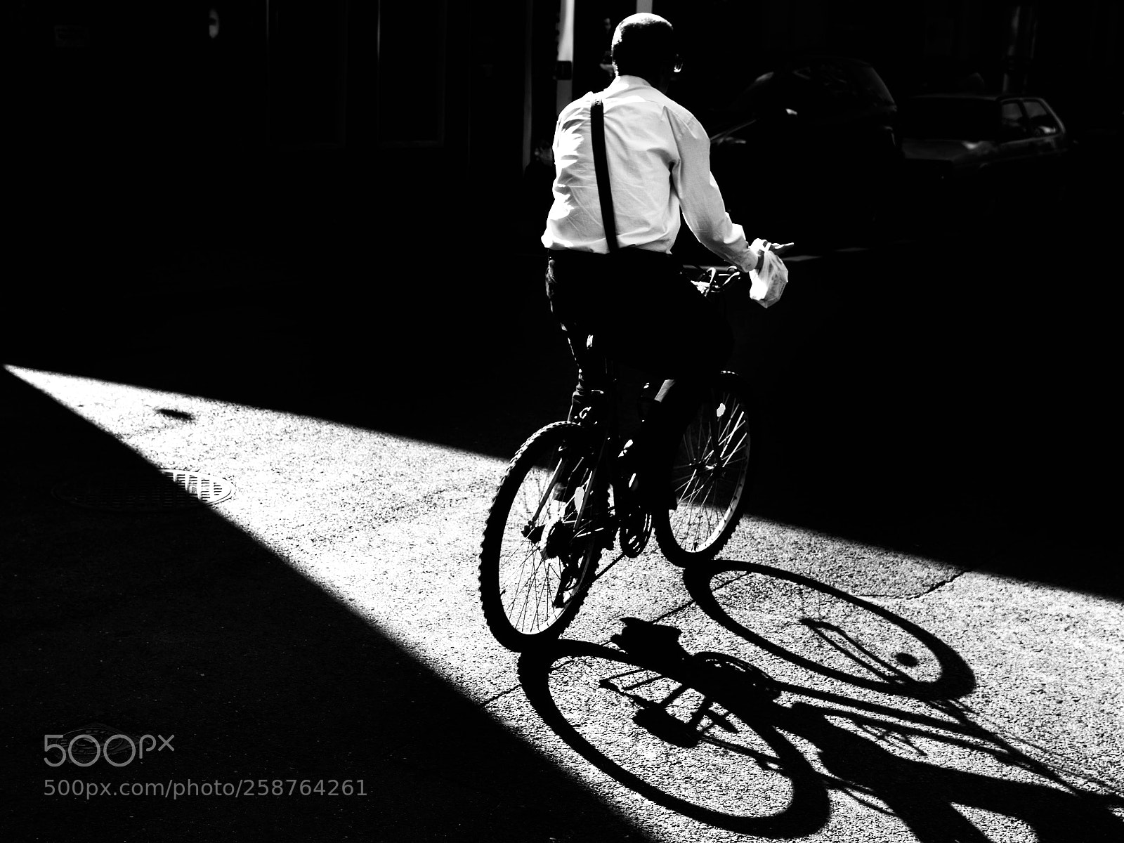 Nikon D5500 sample photo. Cyclist in sunlight photography