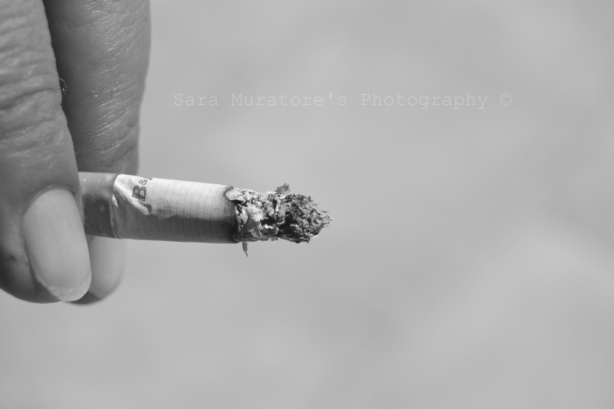 Nikon D3100 sample photo. Cigarette photography