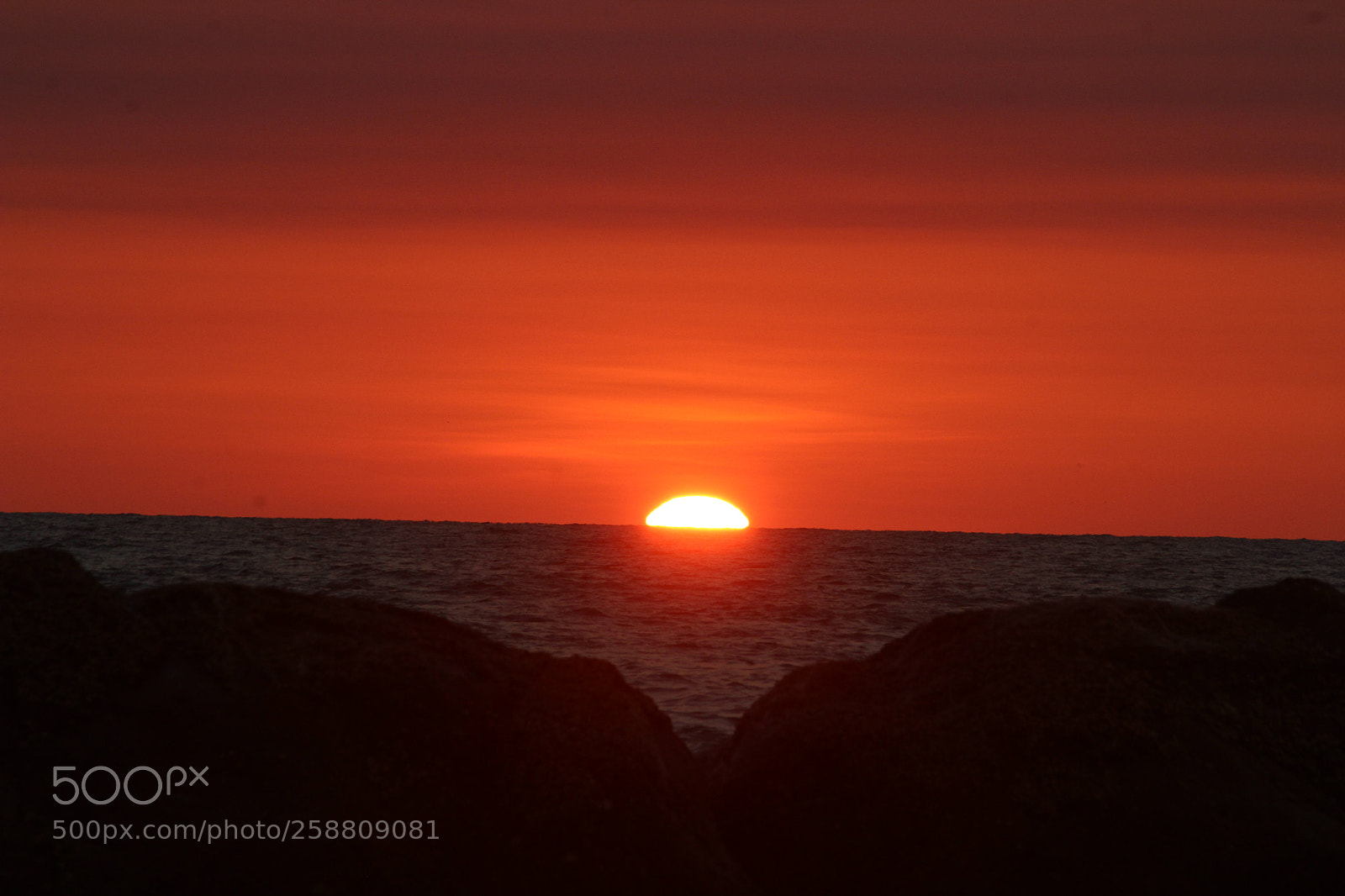 Canon EF-S 55-250mm F4-5.6 IS II sample photo. Serene sunset photography